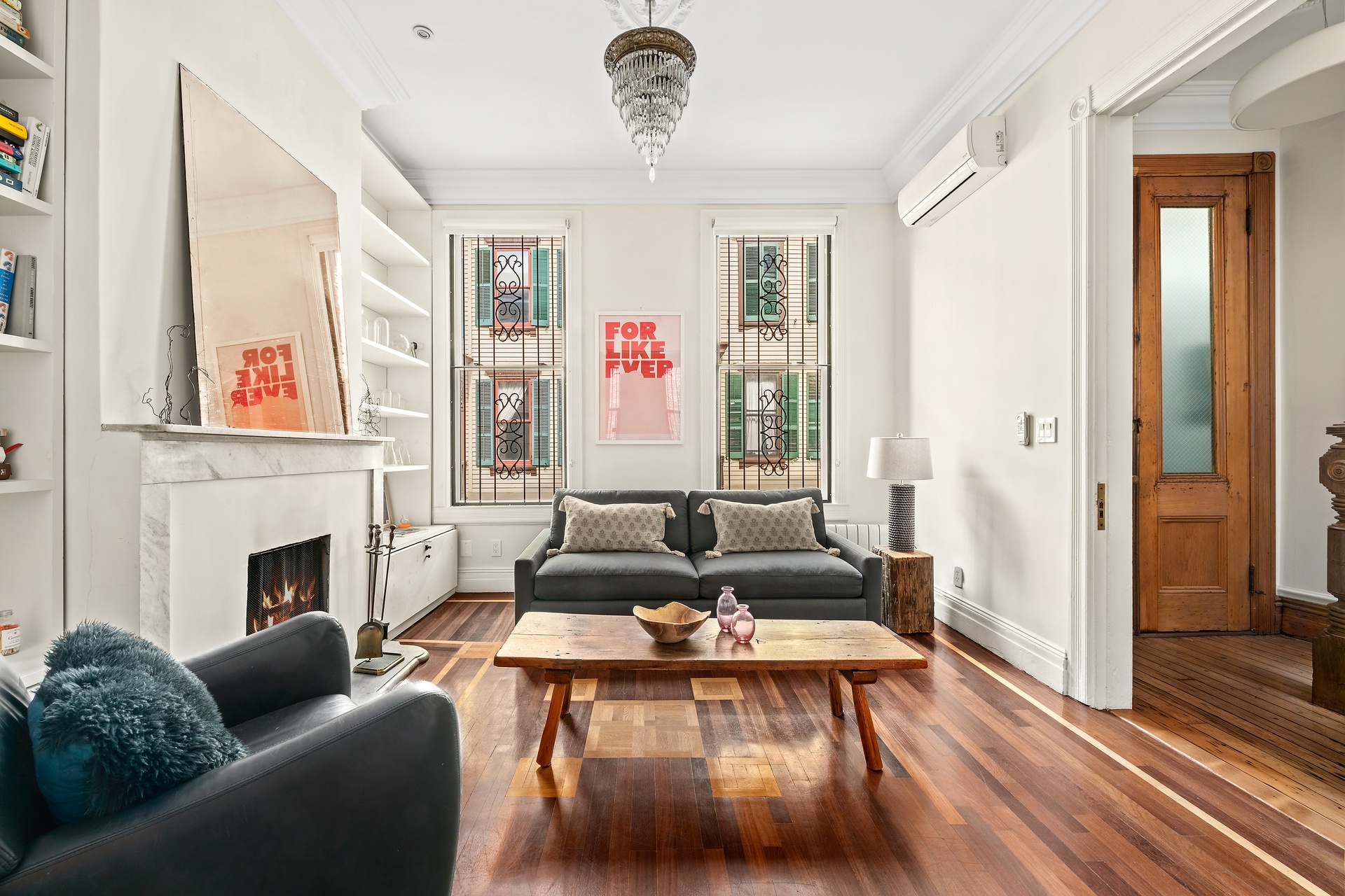8 Sylvan Terrace Manhattan, NY 10032 - Photo 2 of 19 a living room with furniture windows and a fireplace
