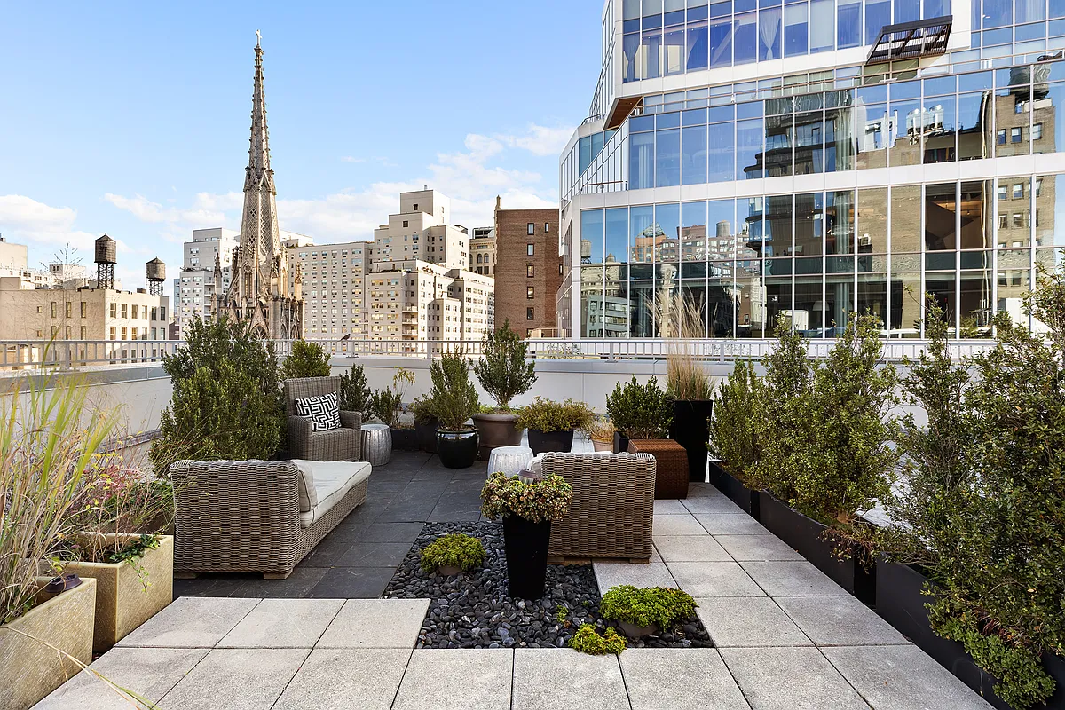 67 East 11th Street, Unit 624 Manhattan, NY 10003 - Photo 7 of 13 a view of a patio with couches and potted plants
