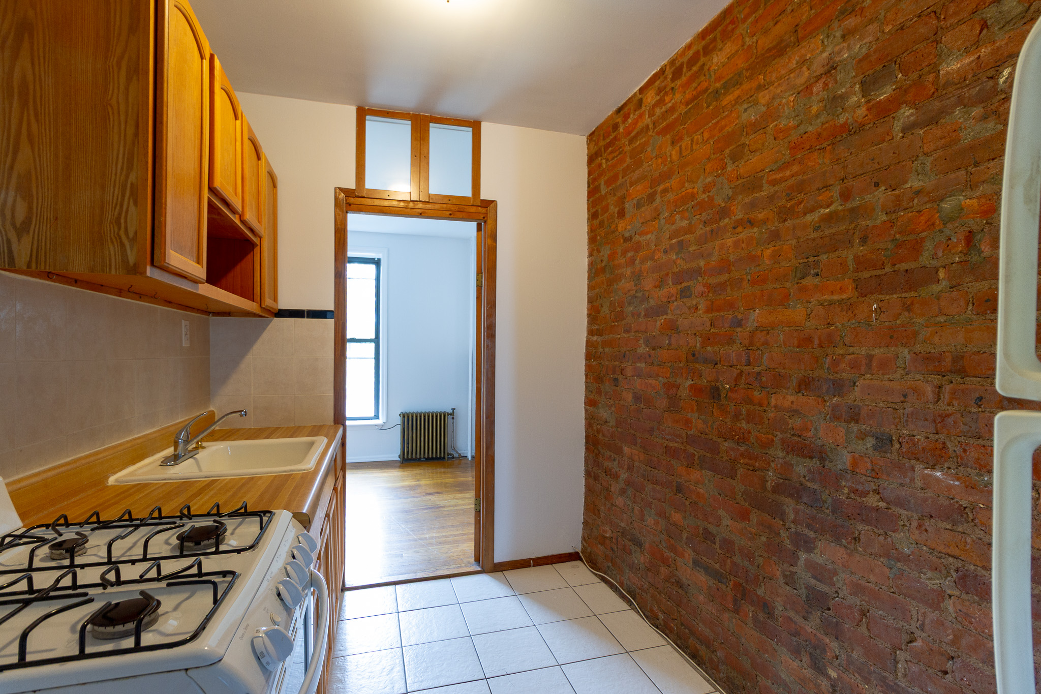 312 Prospect Avenue, Unit 2R Brooklyn, NY 11215 - Photo 8 of 10 a bathroom with a sink and a mirror