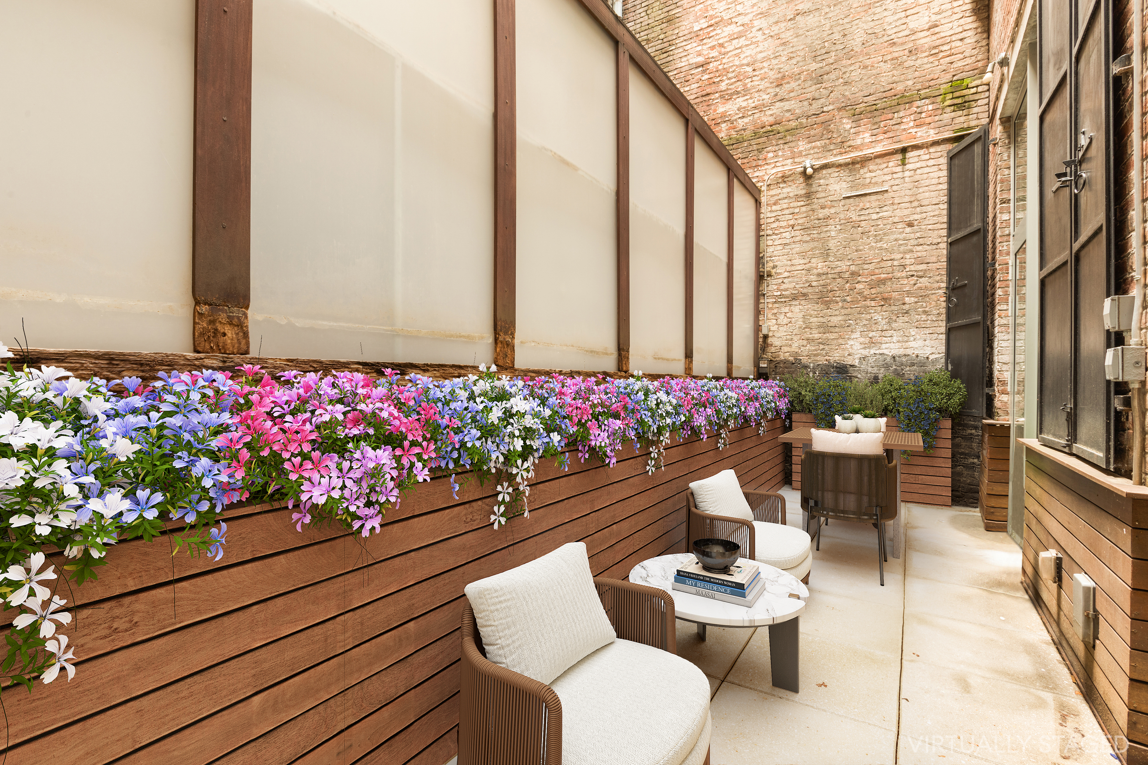 93 Reade Street, Unit 2 Manhattan, NY 10013 - Photo 8 of 9 a outdoor living space with furniture and flowers