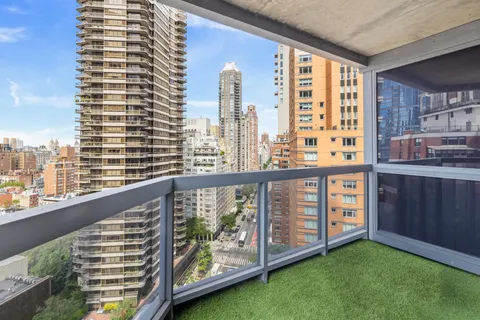 a view of a city from a balcony