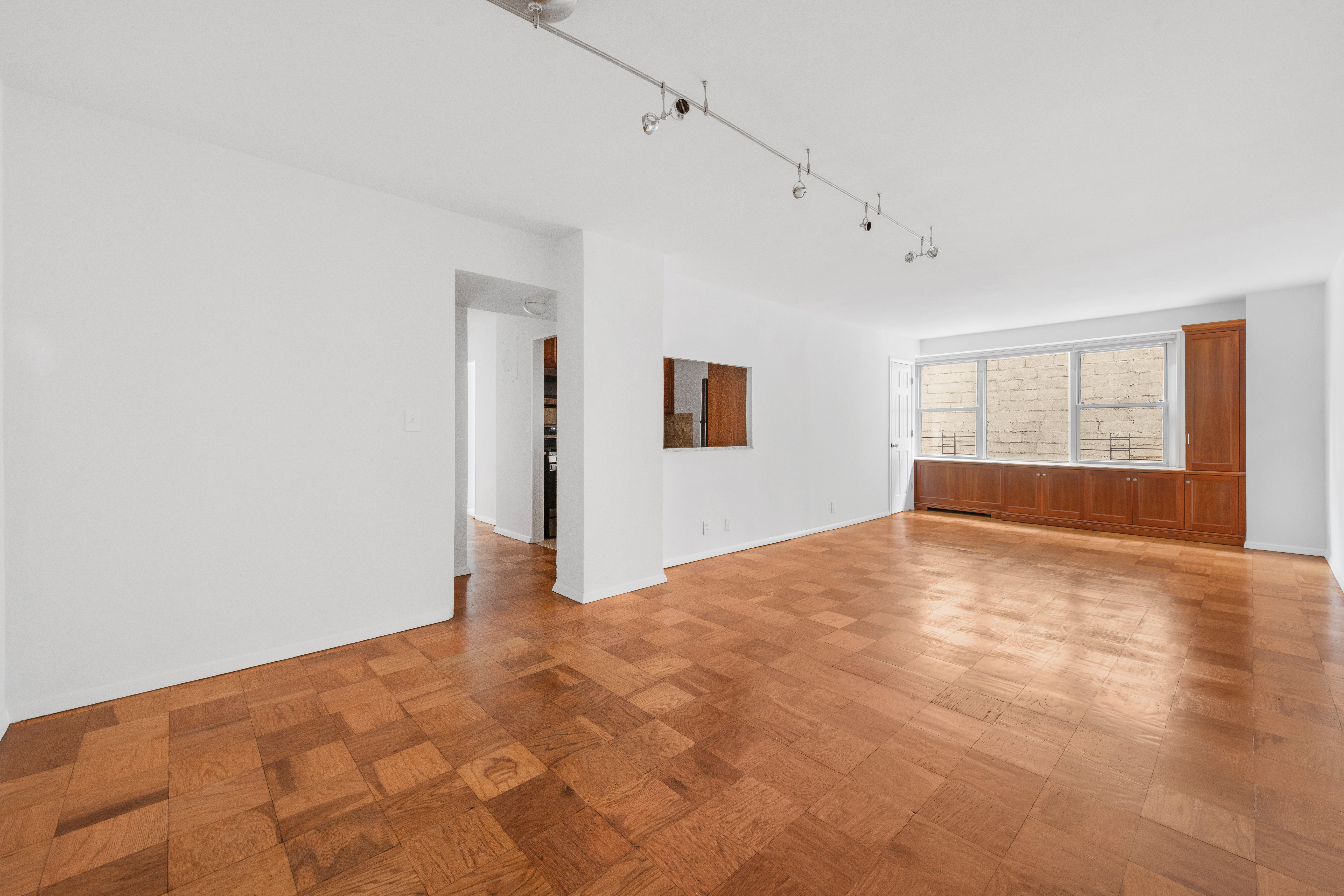 370 East 76th Street, Unit C607 Manhattan, NY 10021 - Photo 4 of 12 a view of an empty room with a window
