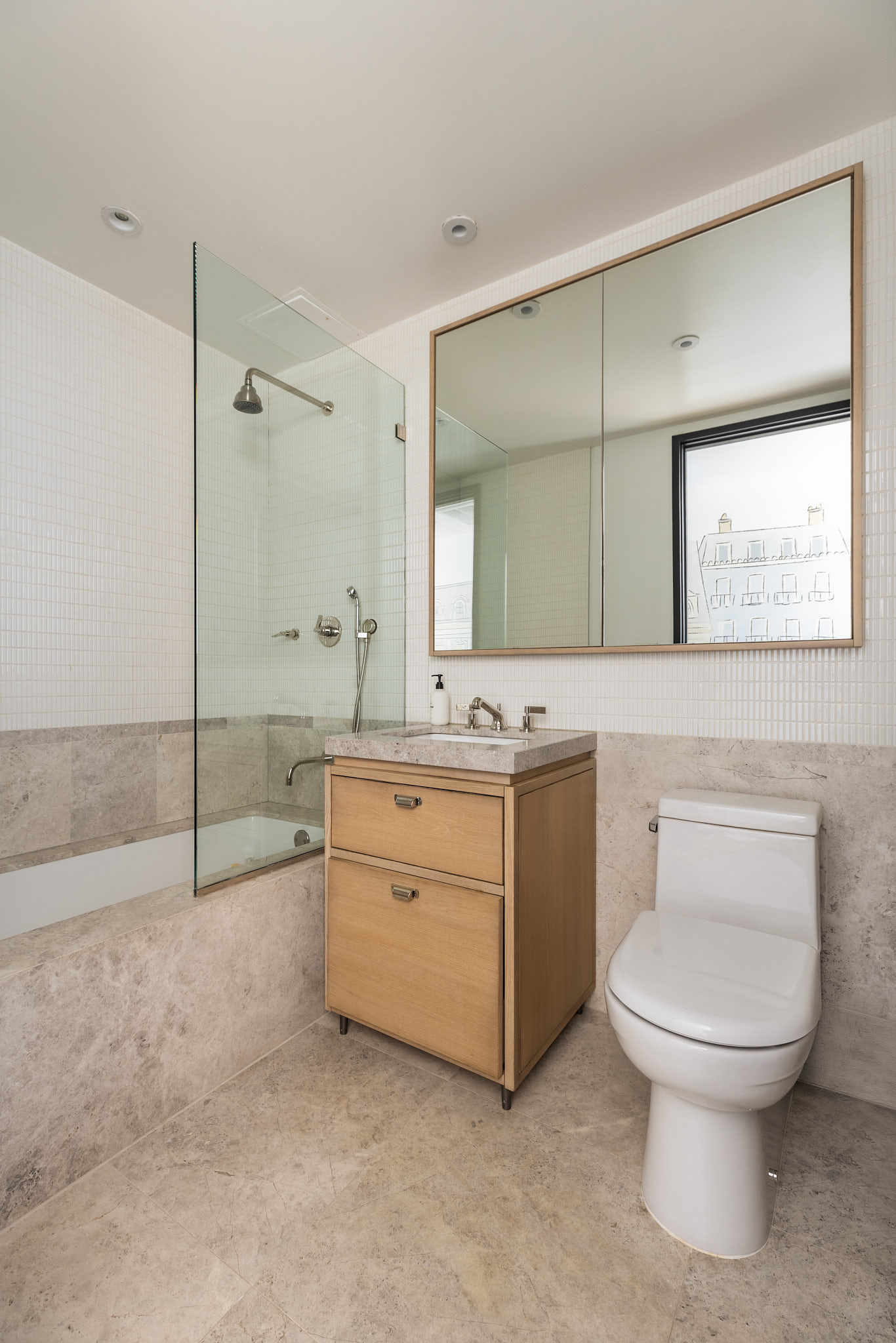51 Jay Street, Unit 2A Brooklyn, NY 11201 - Photo 9 of 15 a bathroom with a granite countertop toilet sink and mirror