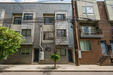 a view of a house with a balcony