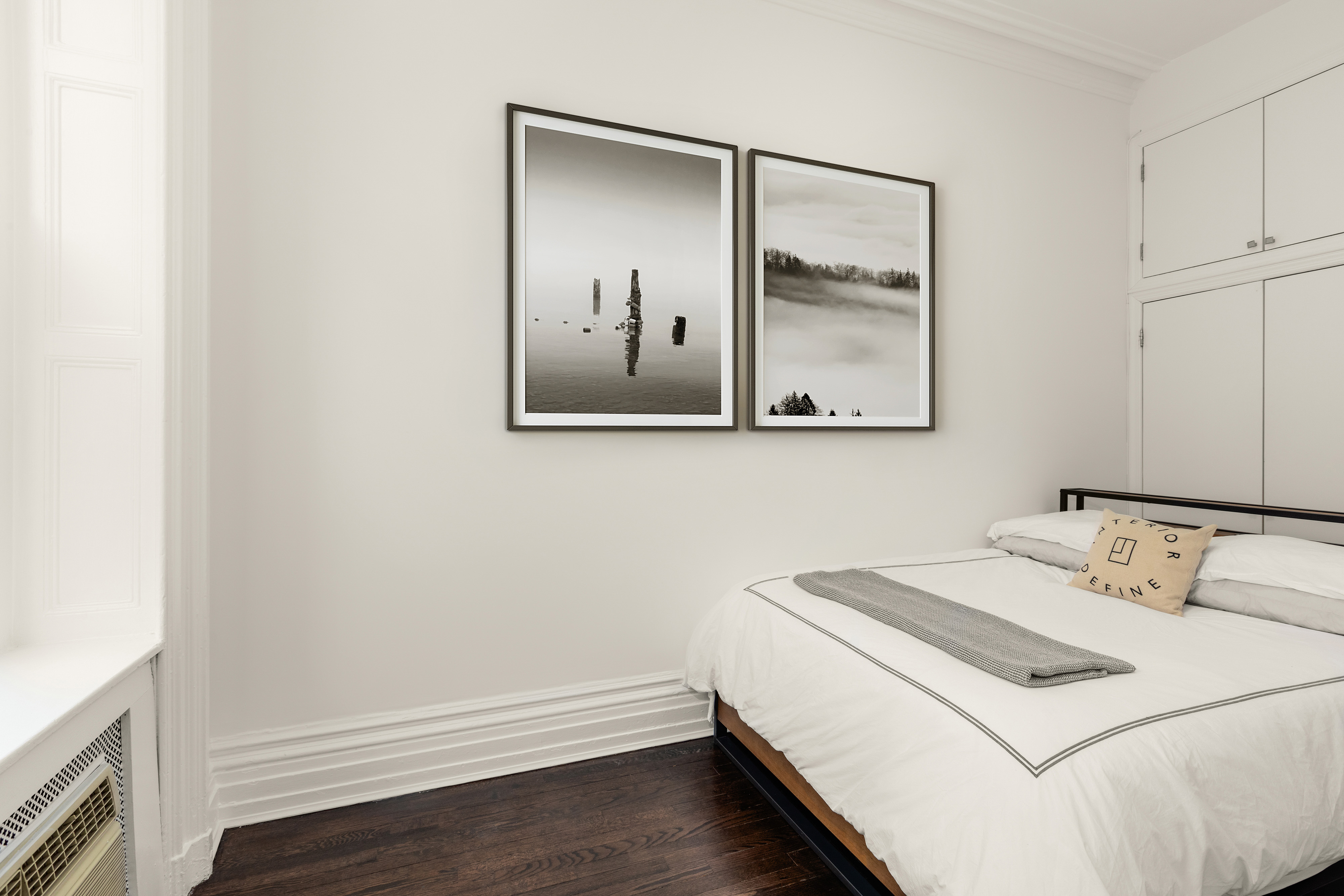 111 East 36th Street, Unit 4A Manhattan, NY 10016 - Photo 9 of 19 a bedroom with a bed and a window