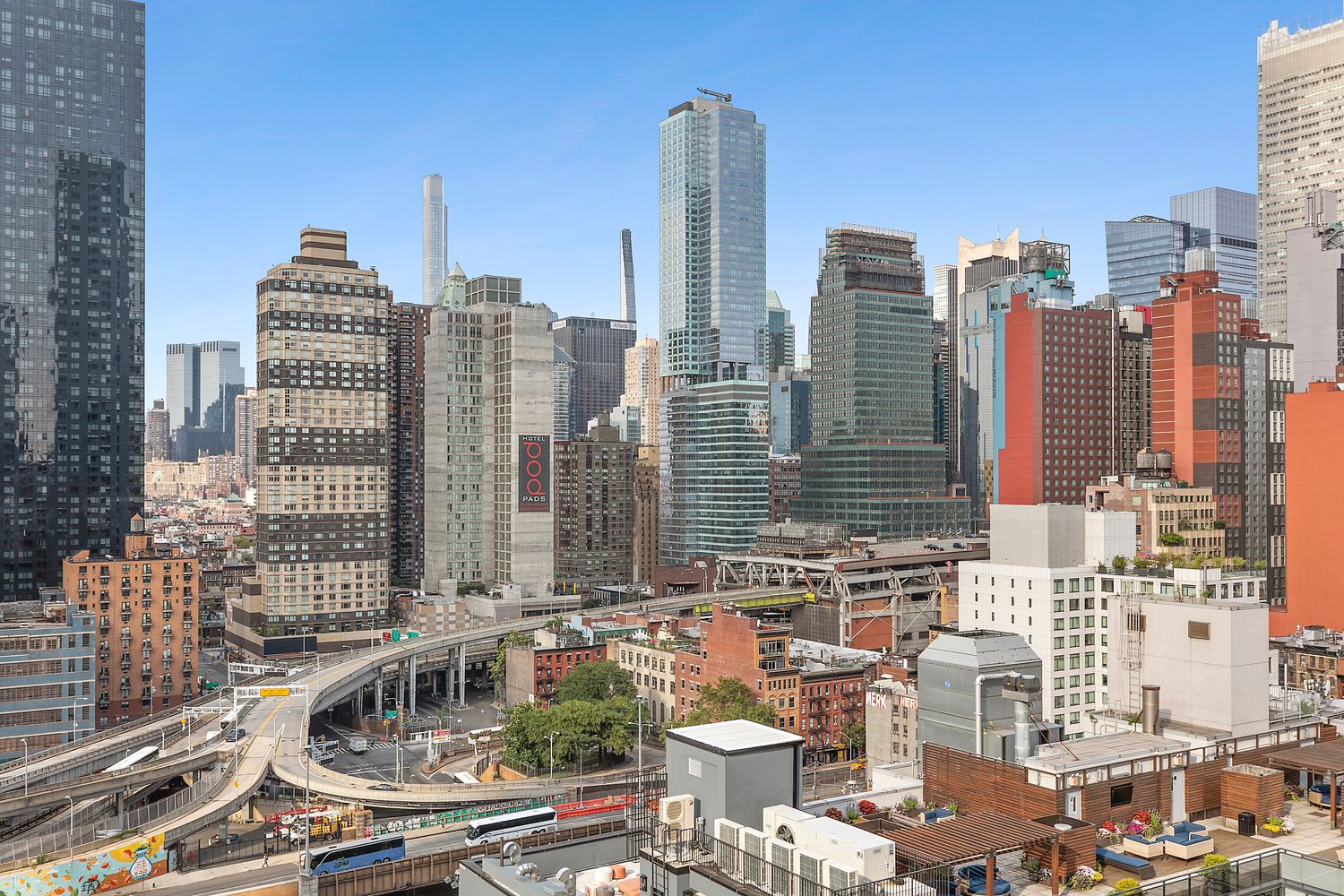448 West 37th Street, Unit PHA Manhattan, NY 10018 - Photo 3 of 7 a view of city with tall buildings