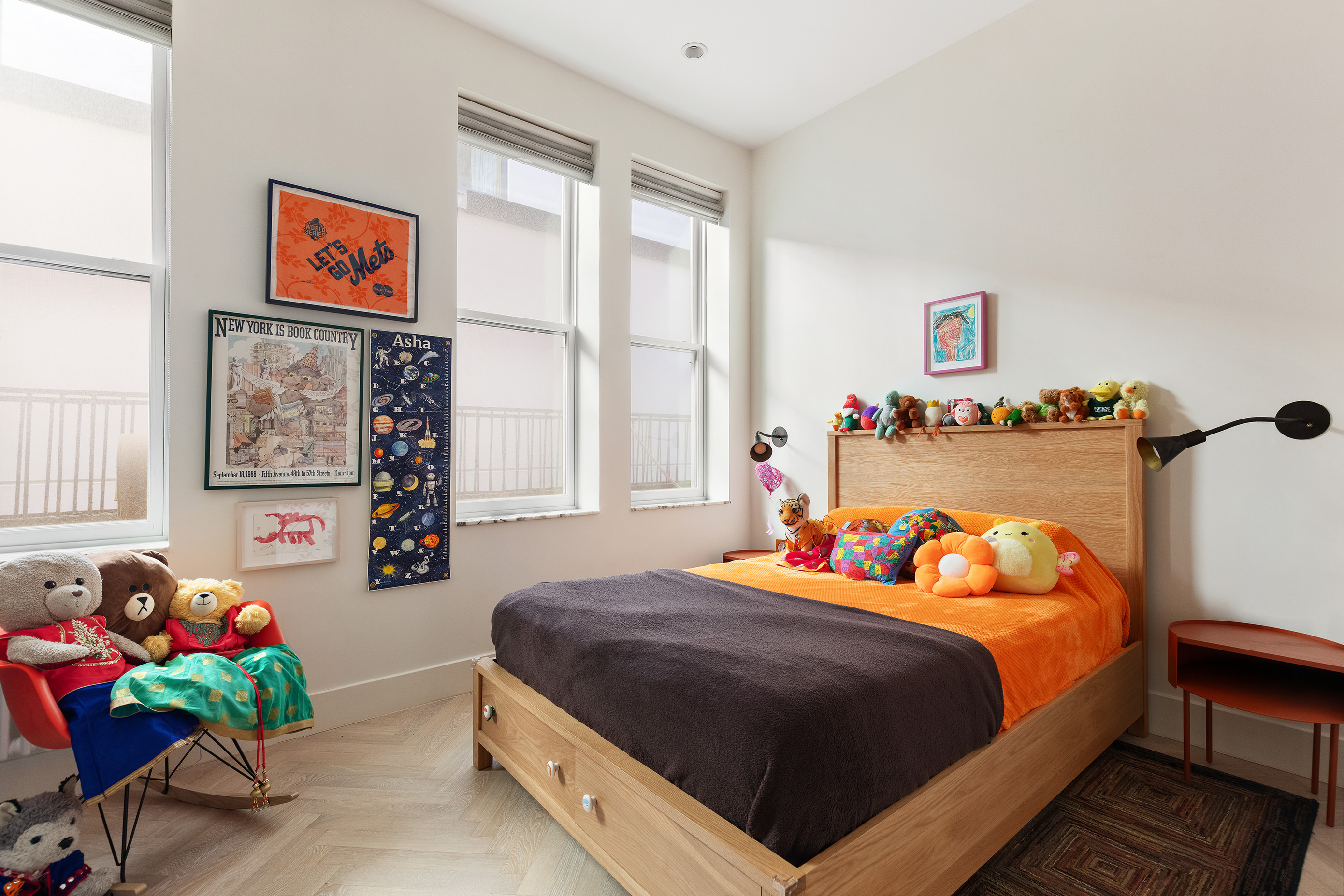 143 West 27th Street, Unit 2R Manhattan, NY 10001 - Photo 8 of 13 a bedroom with a bed and a window