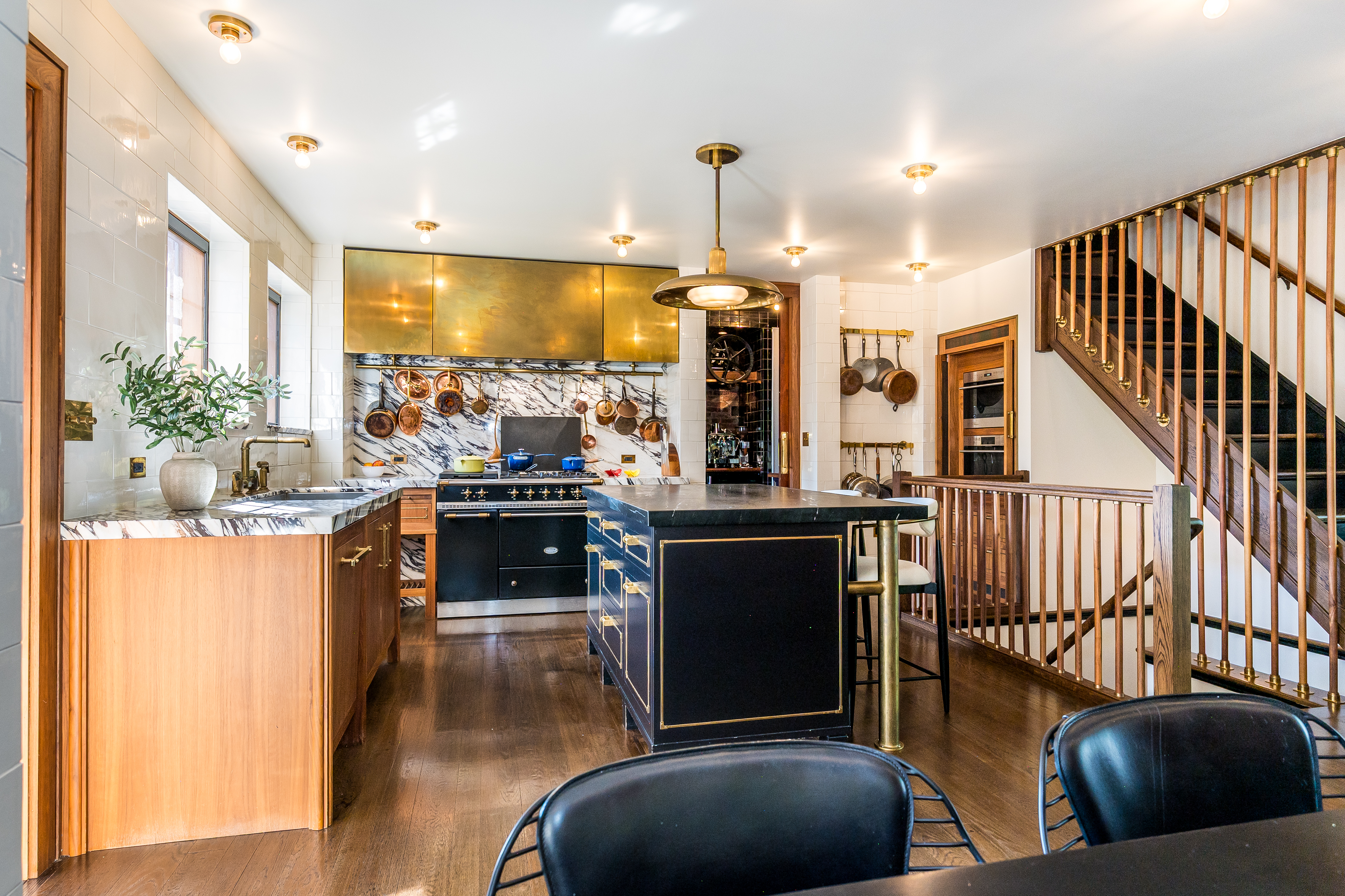 85 Clinton Avenue Montclair, NJ 07042 - Photo 27 of 65 a kitchen with stainless steel appliances granite countertop a stove and a refrigerator