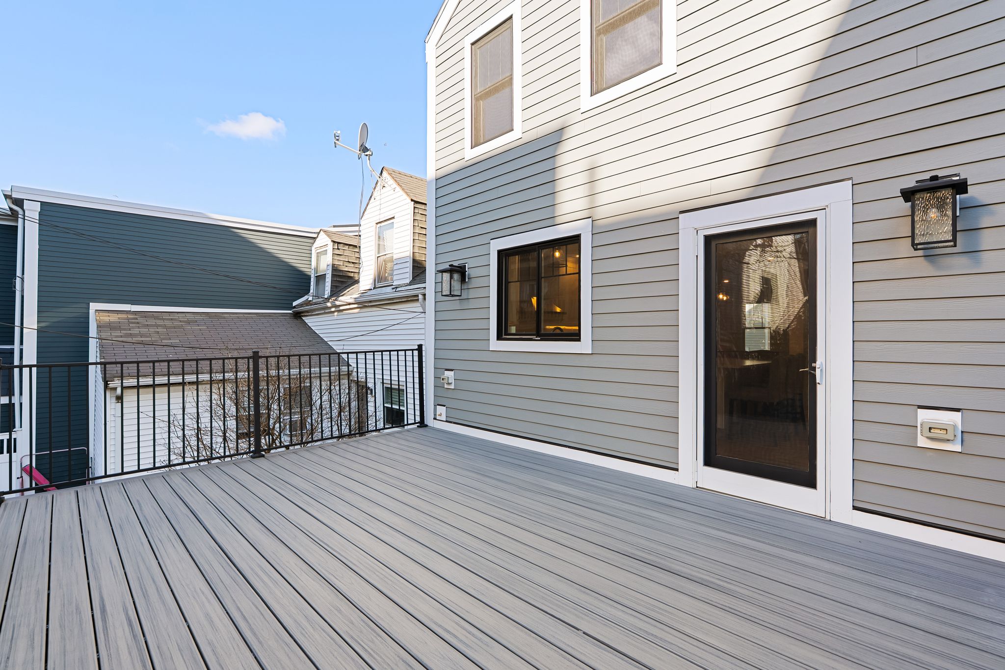 367 Silver Street South Boston, MA 02127 - Photo 7 of 9 a view of a house with wooden deck