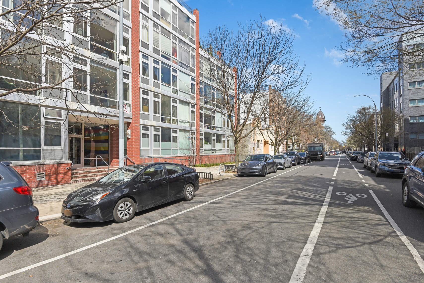 475 Sterling Place, Unit 3A Brooklyn, NY 11238 - Photo 16 of 23 a car parked on the side of a street