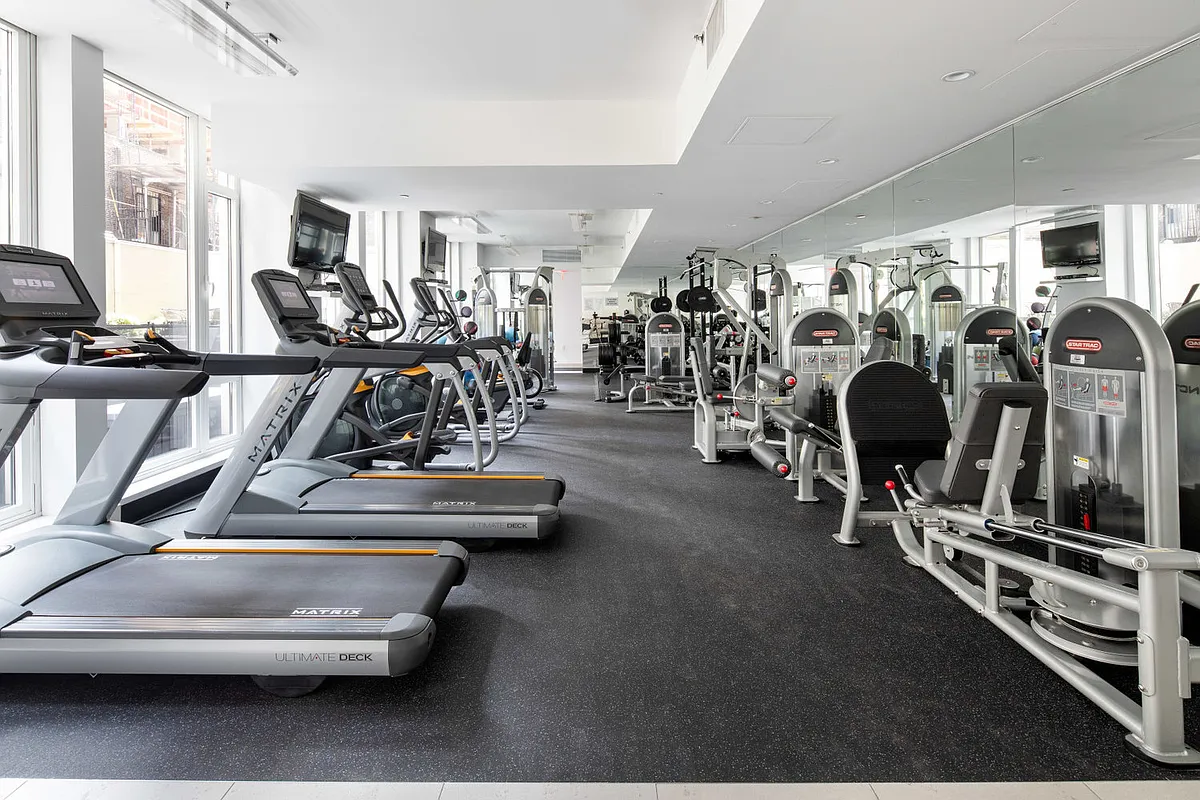 133 West 22nd Street, Unit 6A Manhattan, NY 10011 - Photo 6 of 9 a view of a room with gym equipment