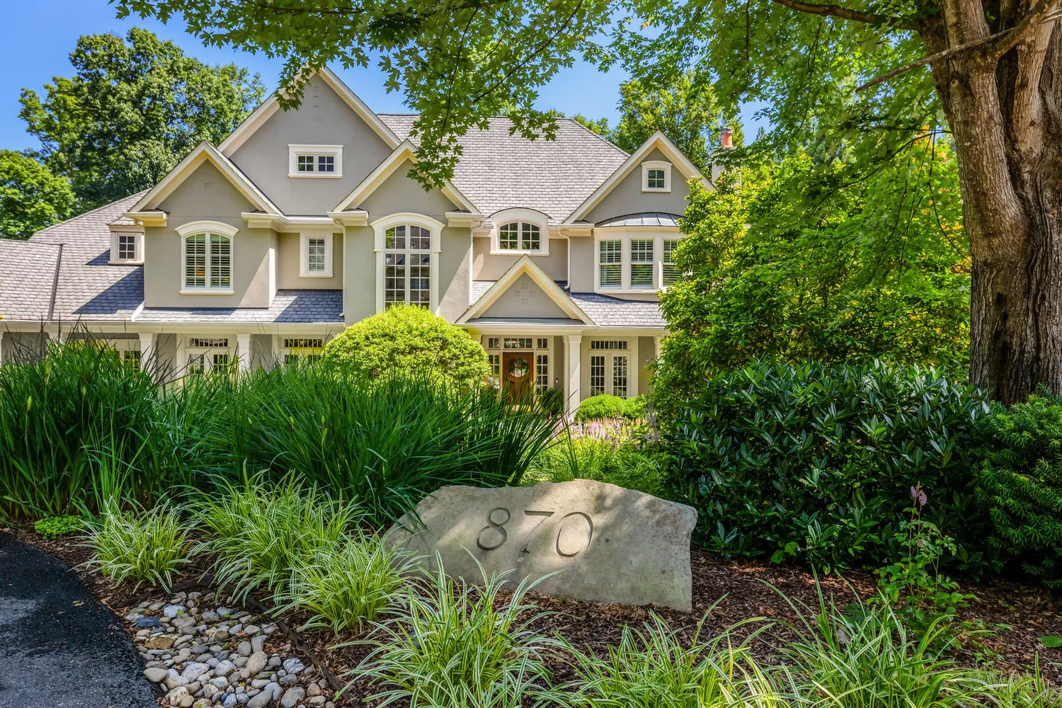a view of a table and chairs in the garden
