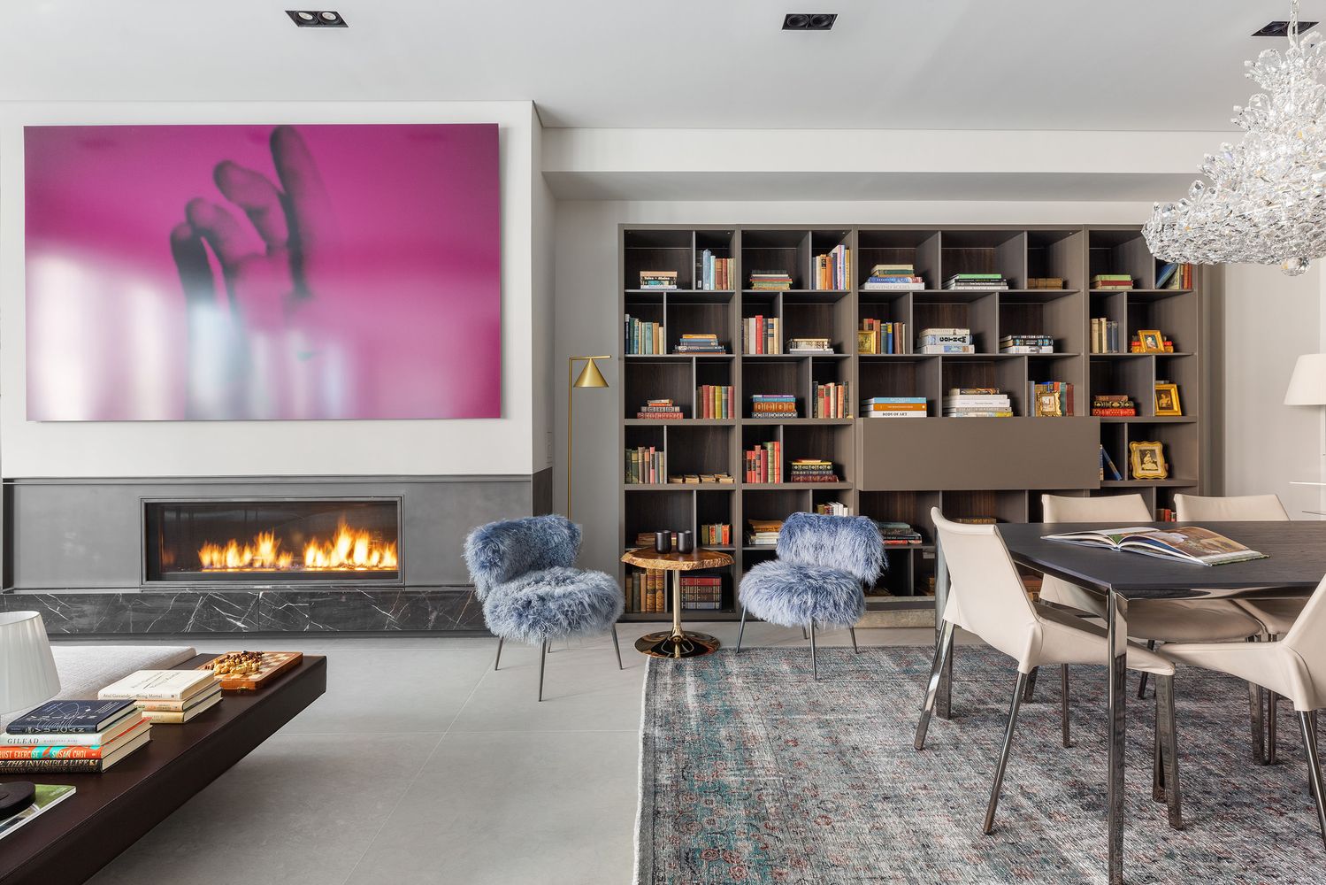 522 West 29th Street, Unit PH9C Manhattan, NY 10001 - Photo 2 of 16 a room with furniture and a fireplace