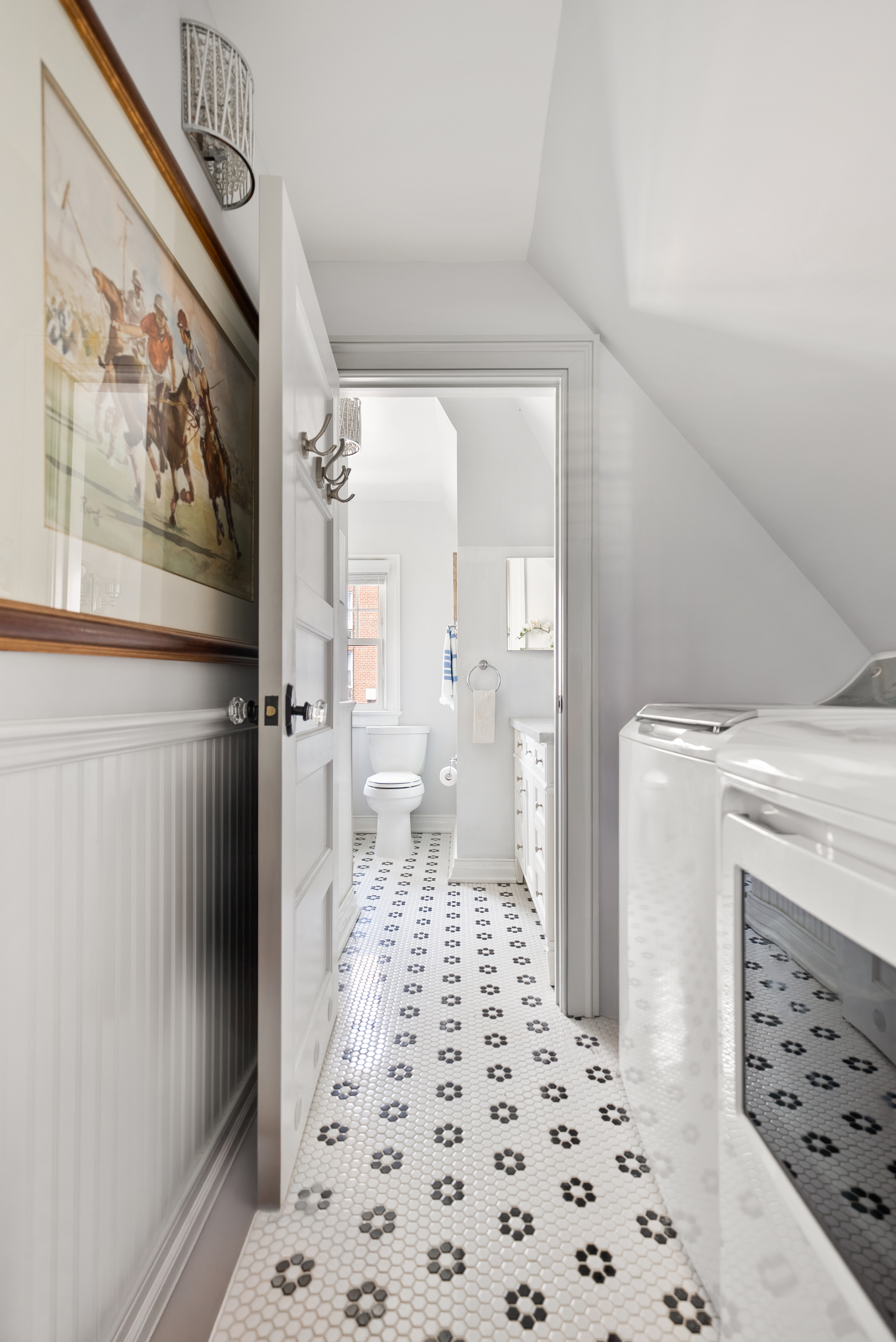139 Winthrop Street, Unit 2 Brooklyn, NY 11225 - Photo 6 of 8 a view of a hallway to a livingroom with wooden floor and a rug