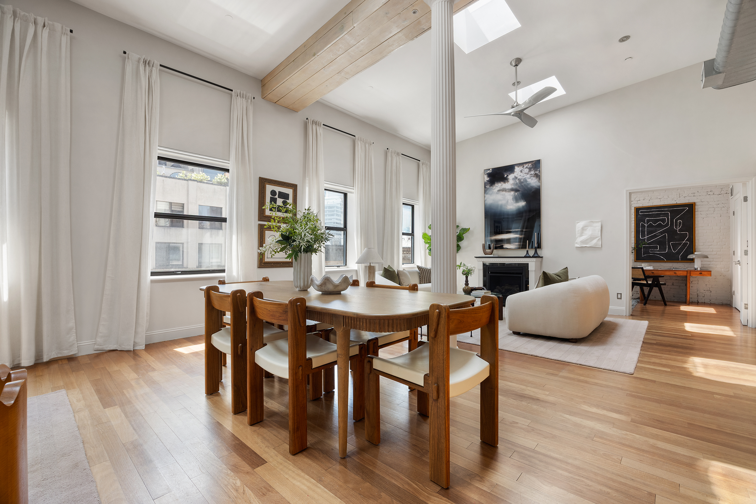 100 Reade Street, Unit 6CD Manhattan, NY 10013 - Photo 10 of 26 a view of a dining room with furniture and wooden floor