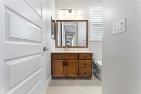 a view of a bedroom from a hallway