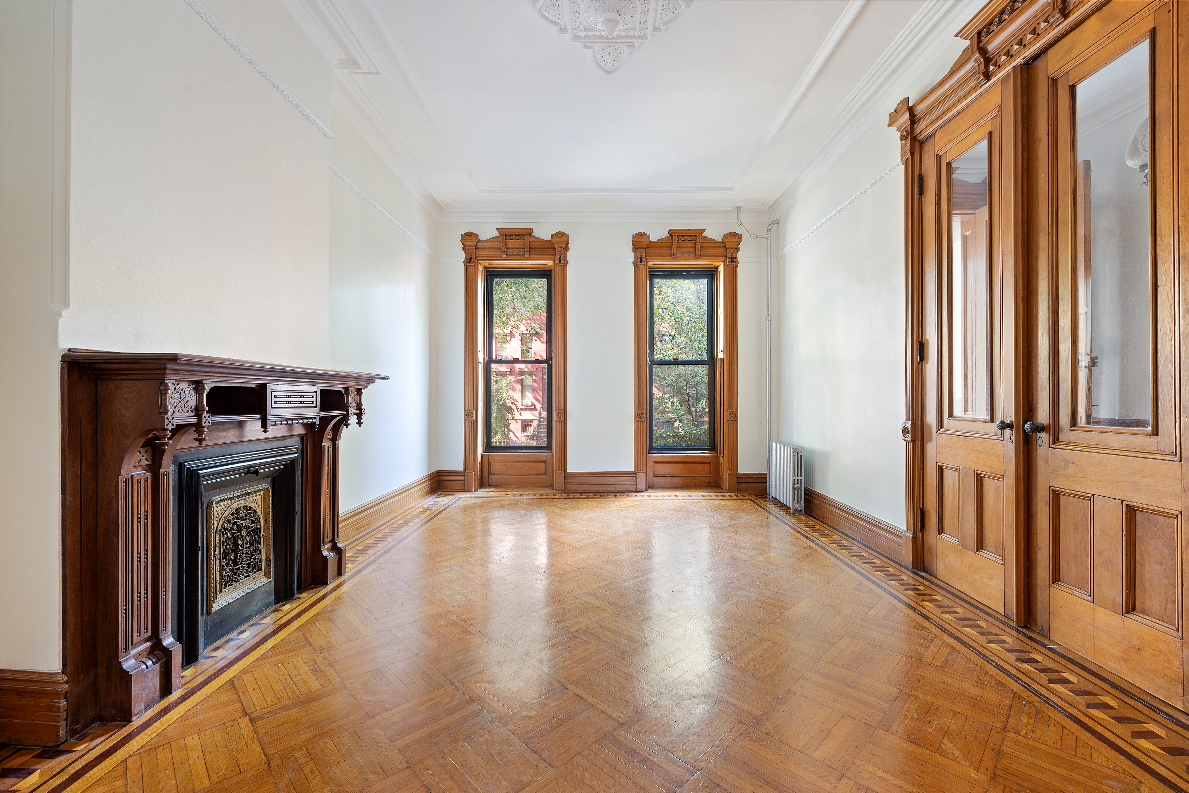 778 Quincy Street, Unit 2 Brooklyn, NY 11221 - Photo 3 of 14 a view of a kitchen with an entryway and wooden floor