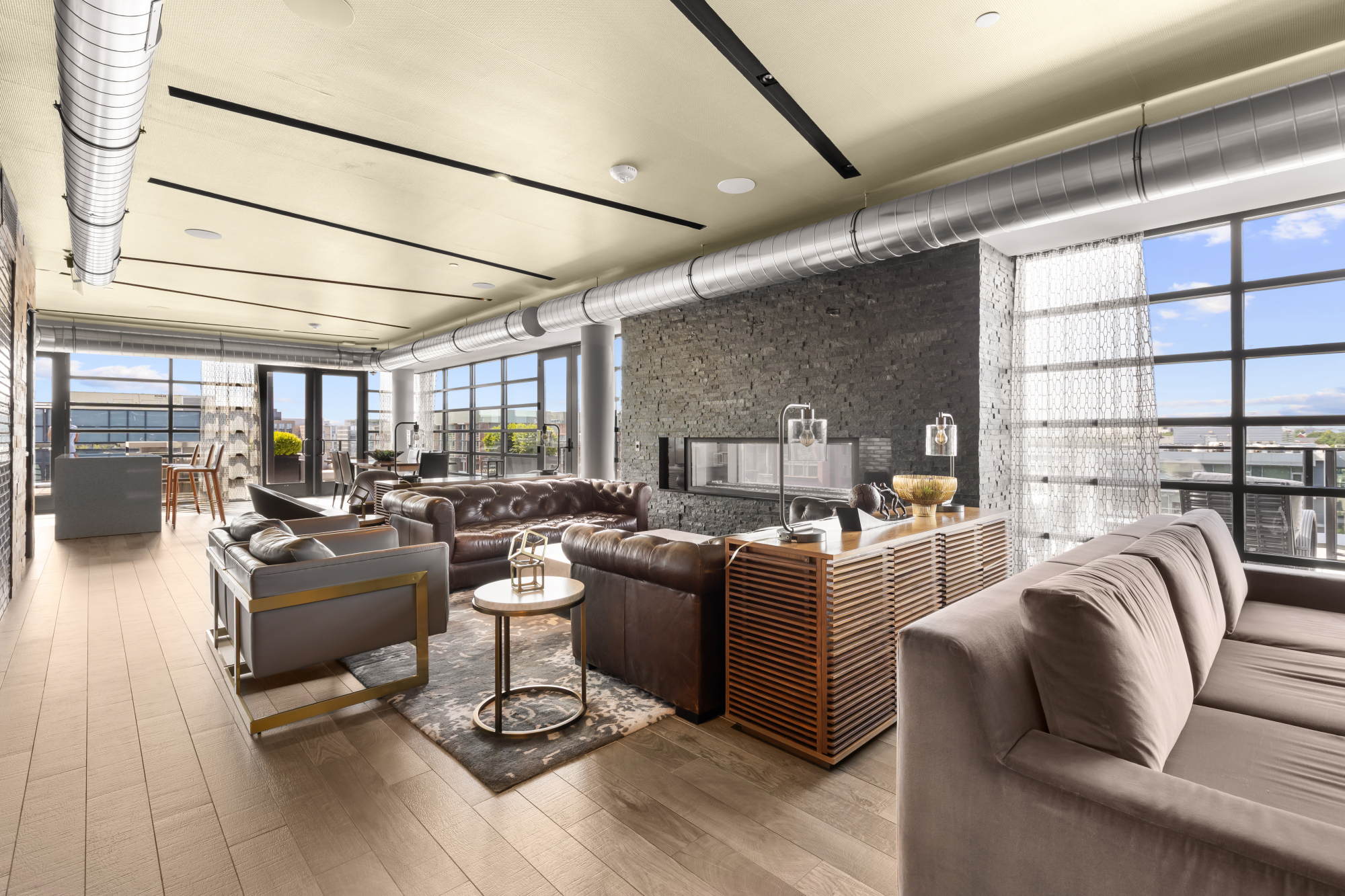 1300 4th Street Southeast, Unit PH02 Washington, DC 20003 - Photo 29 of 38 a living room with lots of furniture and hard wood flooring