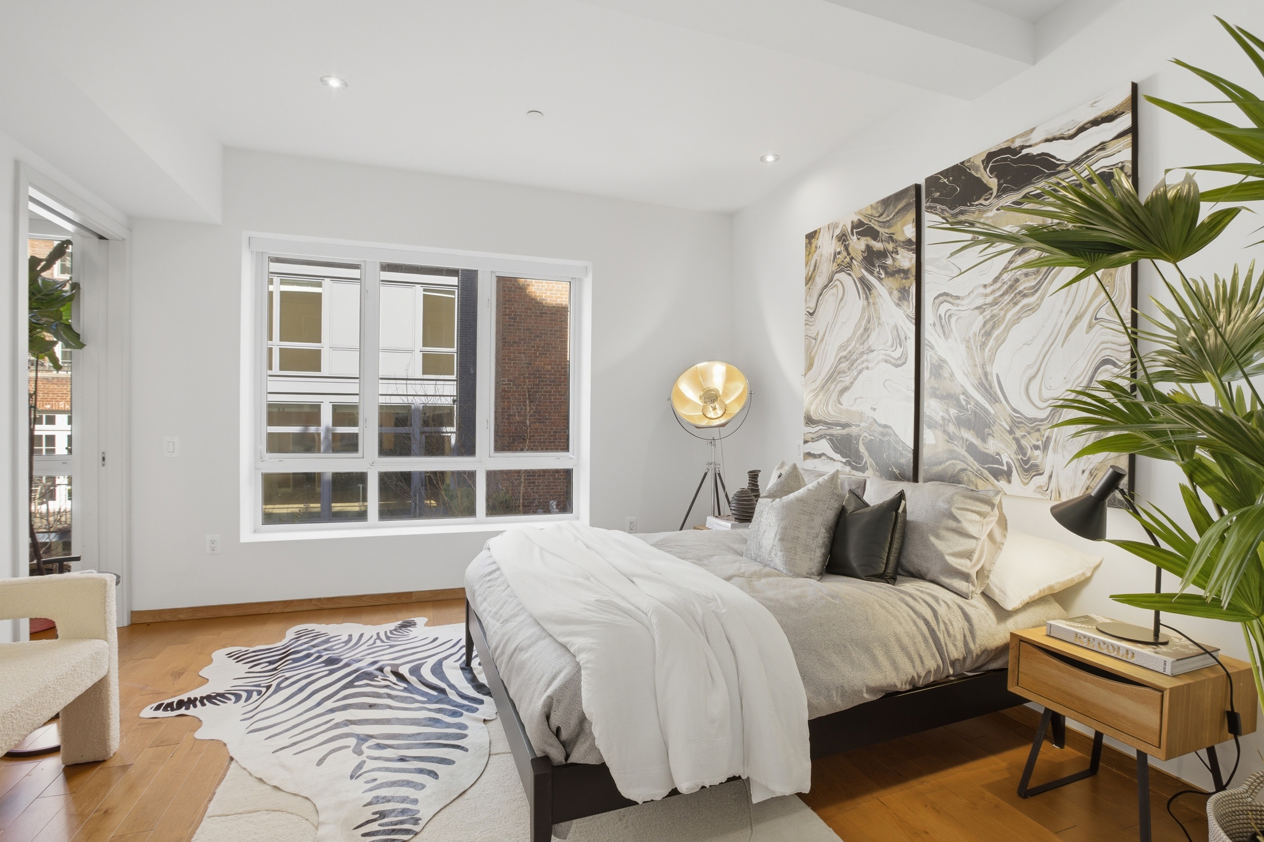 135 West 4th Street, Unit 2W Manhattan, NY 10012 - Photo 11 of 20 a bedroom with a bed and a window