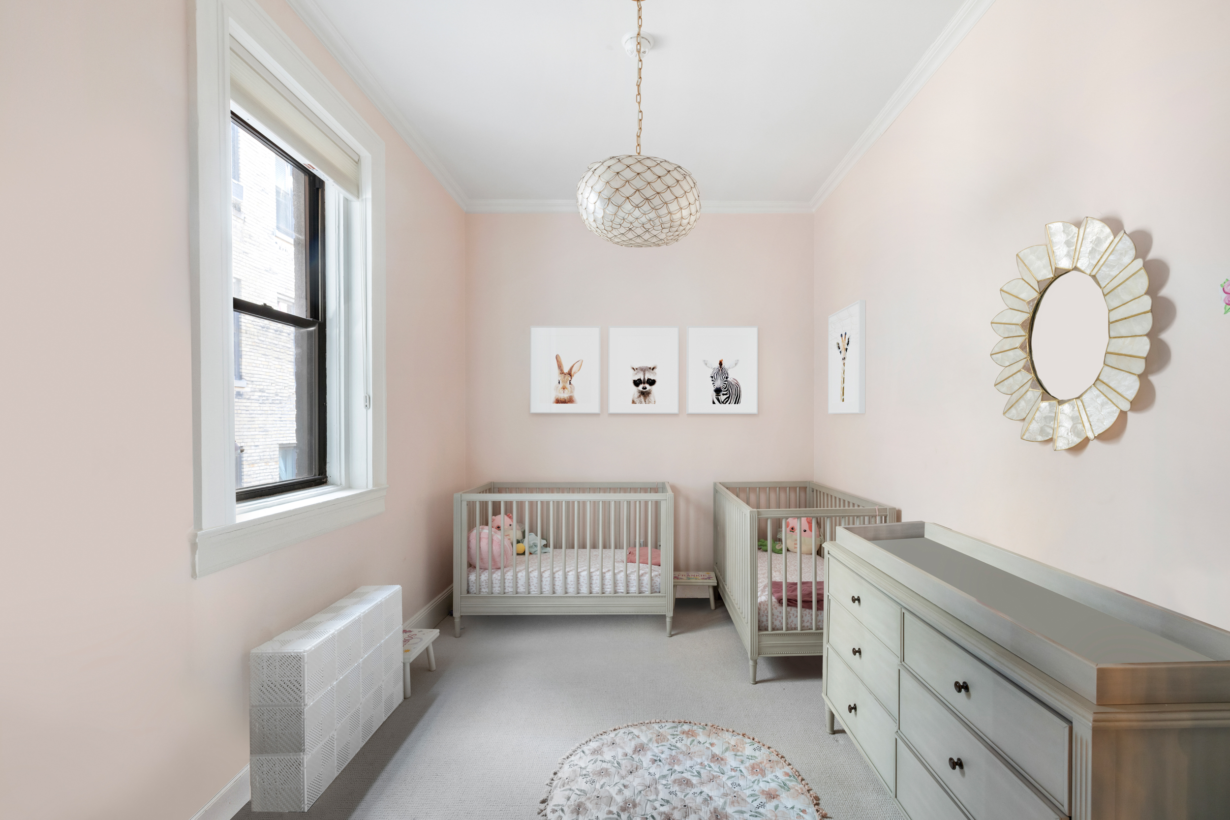 107 East 38th Street, Unit 2AB Manhattan, NY 10016 - Photo 12 of 13 a bedroom with a bed and a window