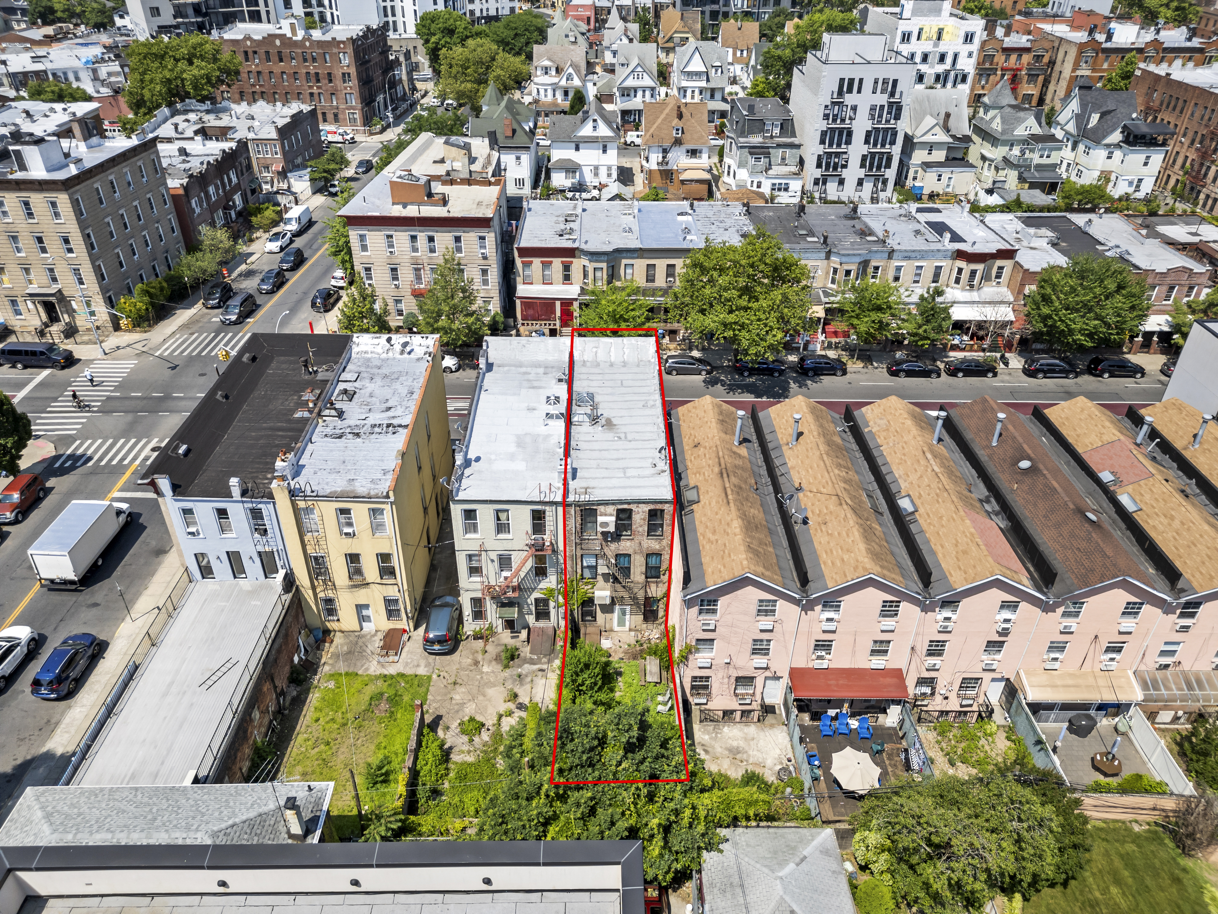 1273 Rogers Avenue, Unit MULTIFAM Brooklyn, NY 11226 - Photo 5 of 13 an aerial view of residential houses with outdoor space