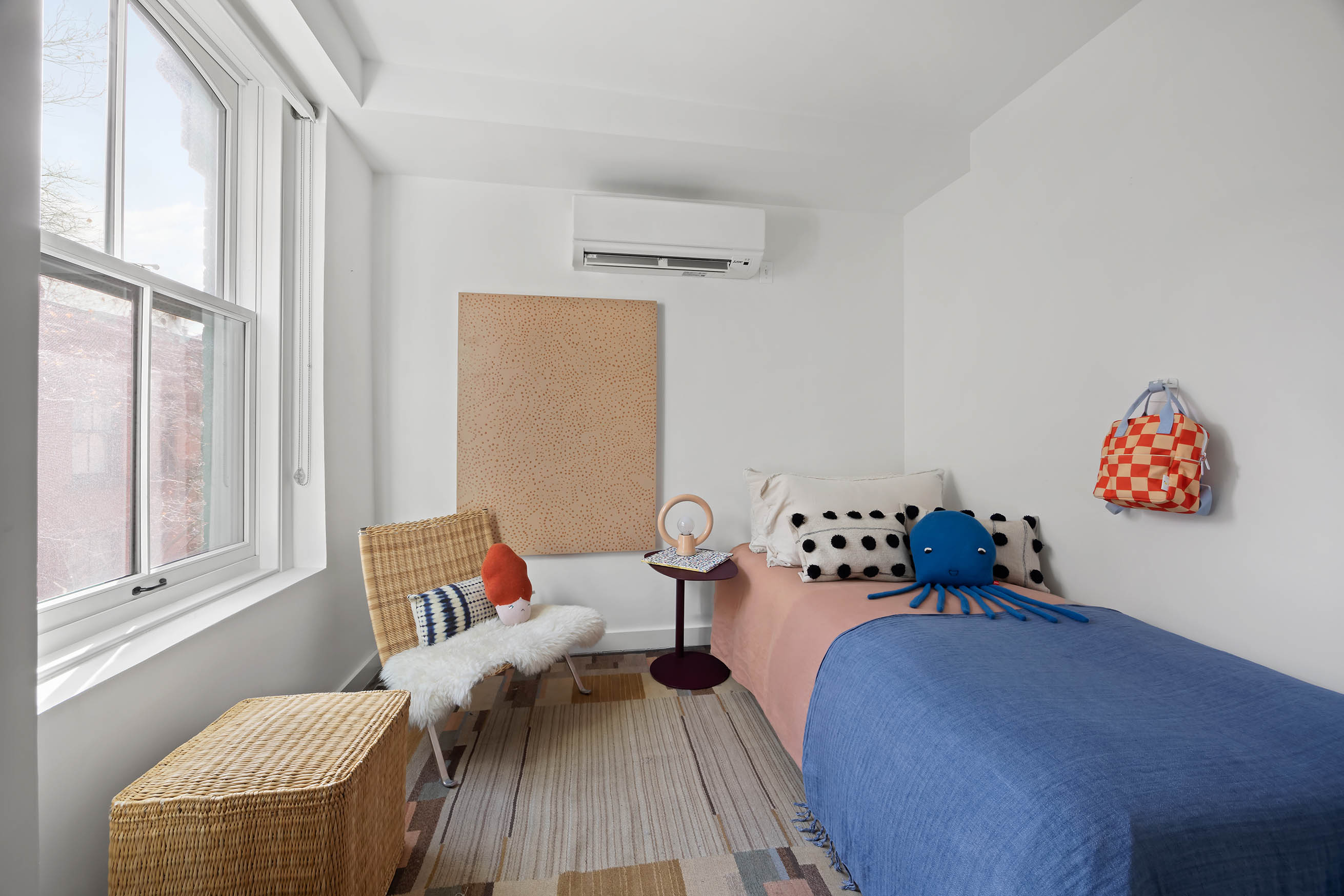 148 Warren Street Brooklyn, NY 11201 - Photo 14 of 20 a bedroom with furniture and a window