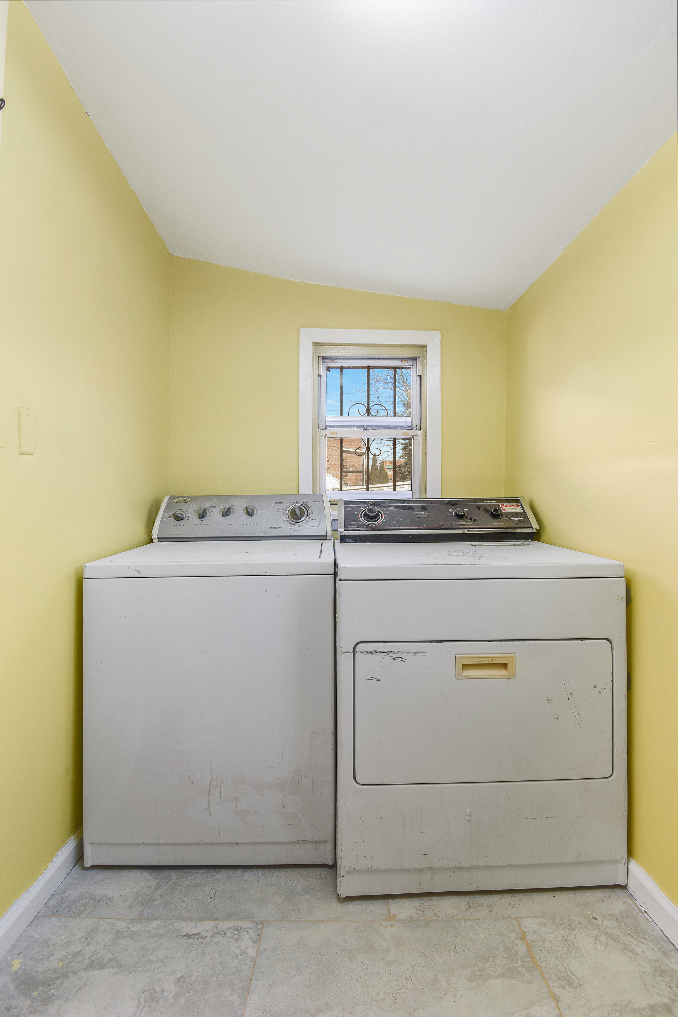 35-47 30th Street, Unit 1 Queens, NY 11106 - Photo 14 of 15 a utility room with dryer and washer