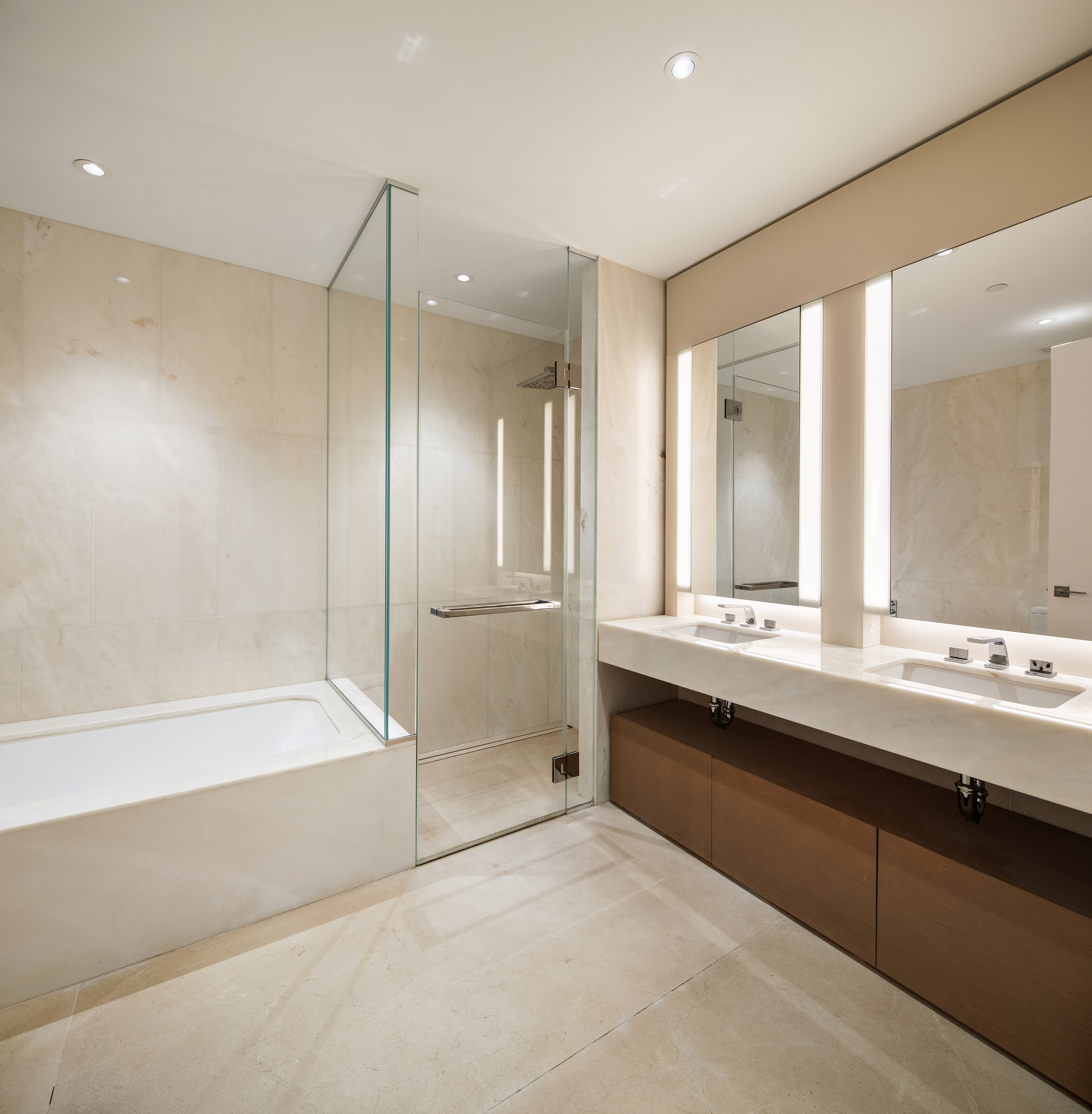 15 Hudson Yards, Unit 37F Manhattan, NY 10001 - Photo 7 of 8 a bathroom with a tub sink shower and mirror