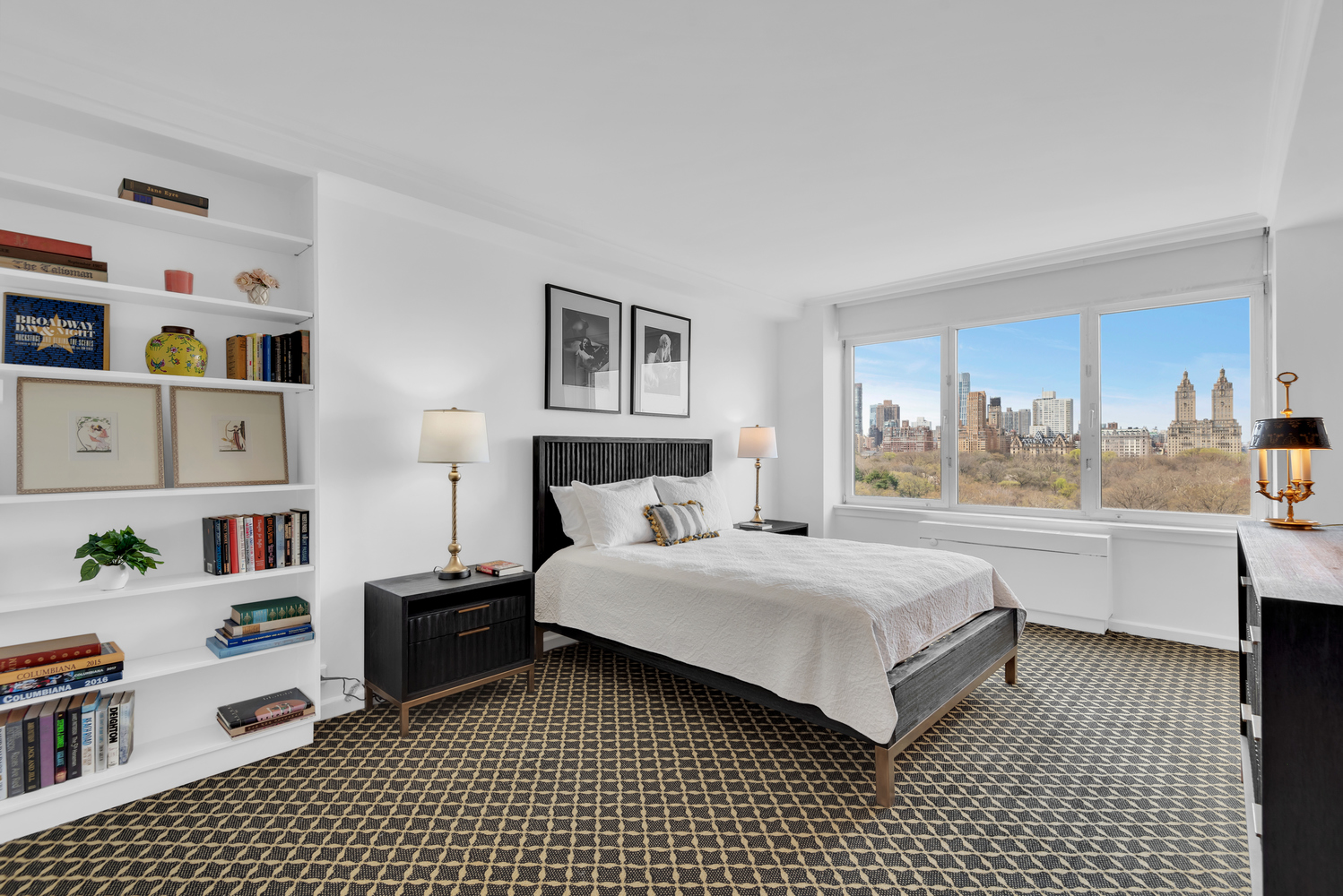 936 5th Avenue, Unit 14B Manhattan, NY 10021 - Photo 6 of 15 a bedroom with a bed and a large window