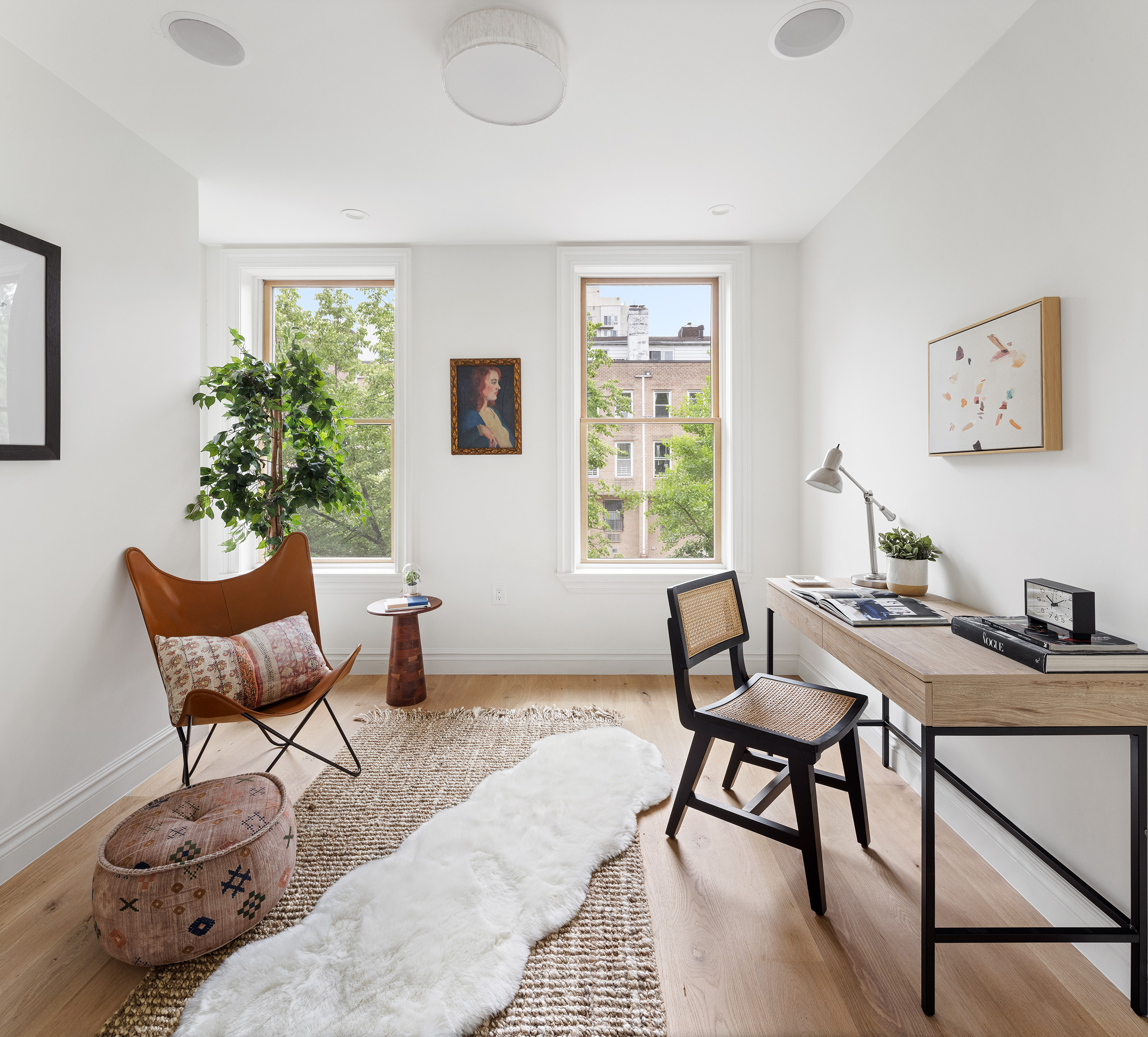 363 Warren Street Brooklyn, NY 11201 - Photo 15 of 23 a workspace with furniture and a window