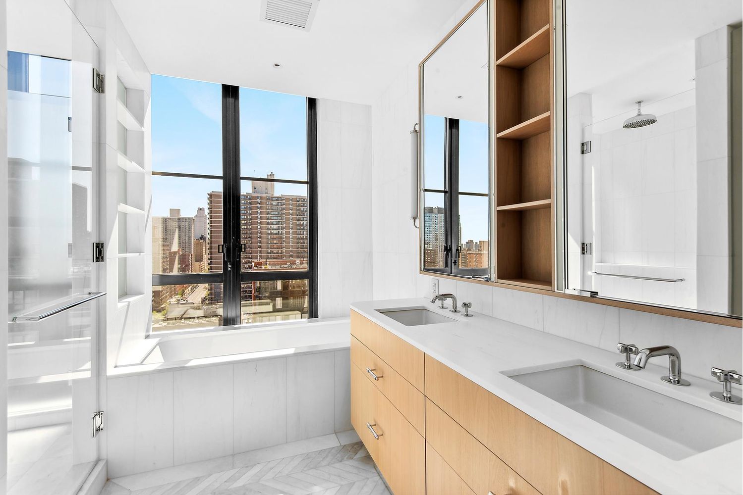 250 West 96th Street, Unit 18C Manhattan, NY 10025 - Photo 9 of 28 a bathroom with a tub sink and mirror