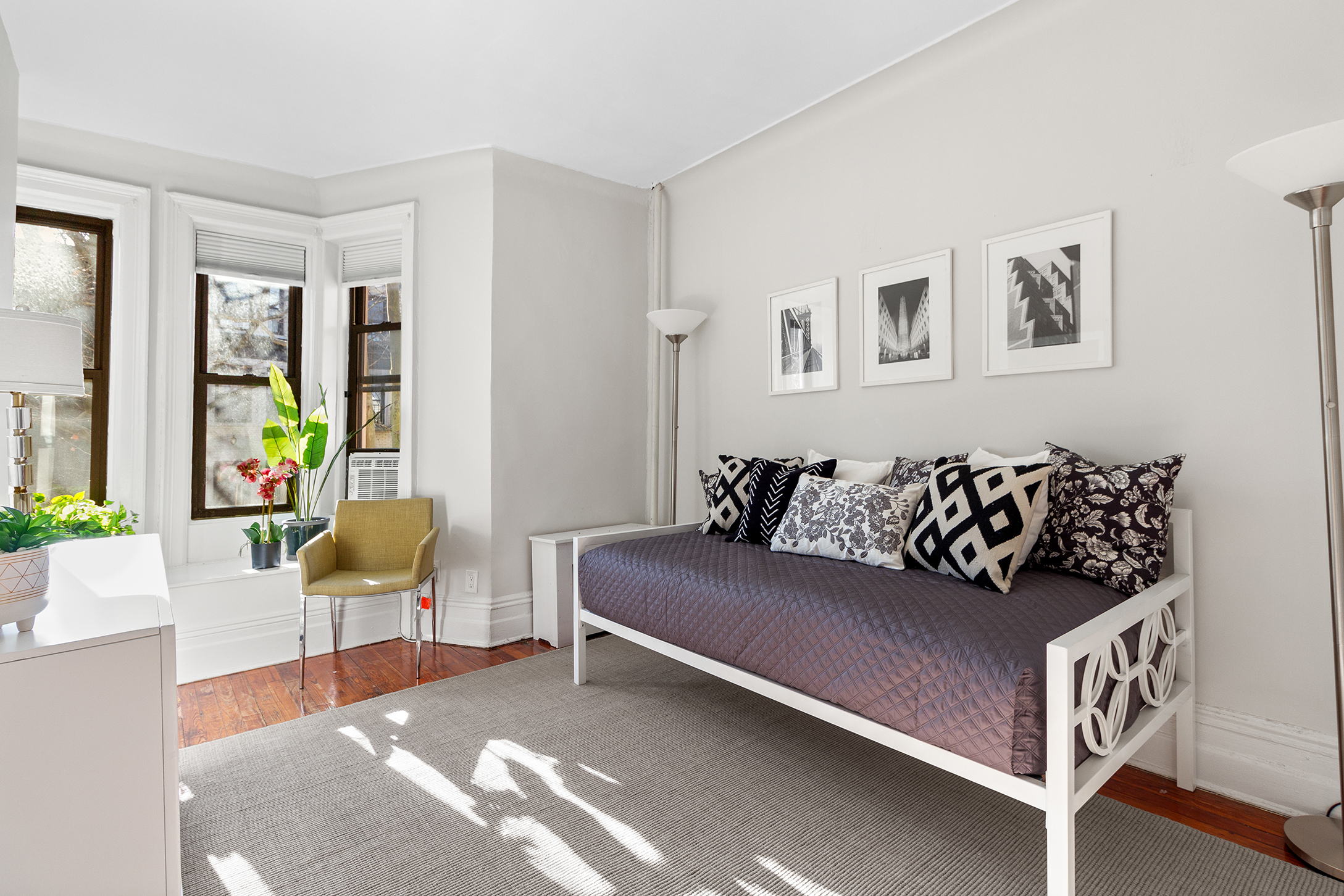 579 5th Street Brooklyn, NY 11215 - Photo 7 of 19 a living room with furniture and painting on the wall
