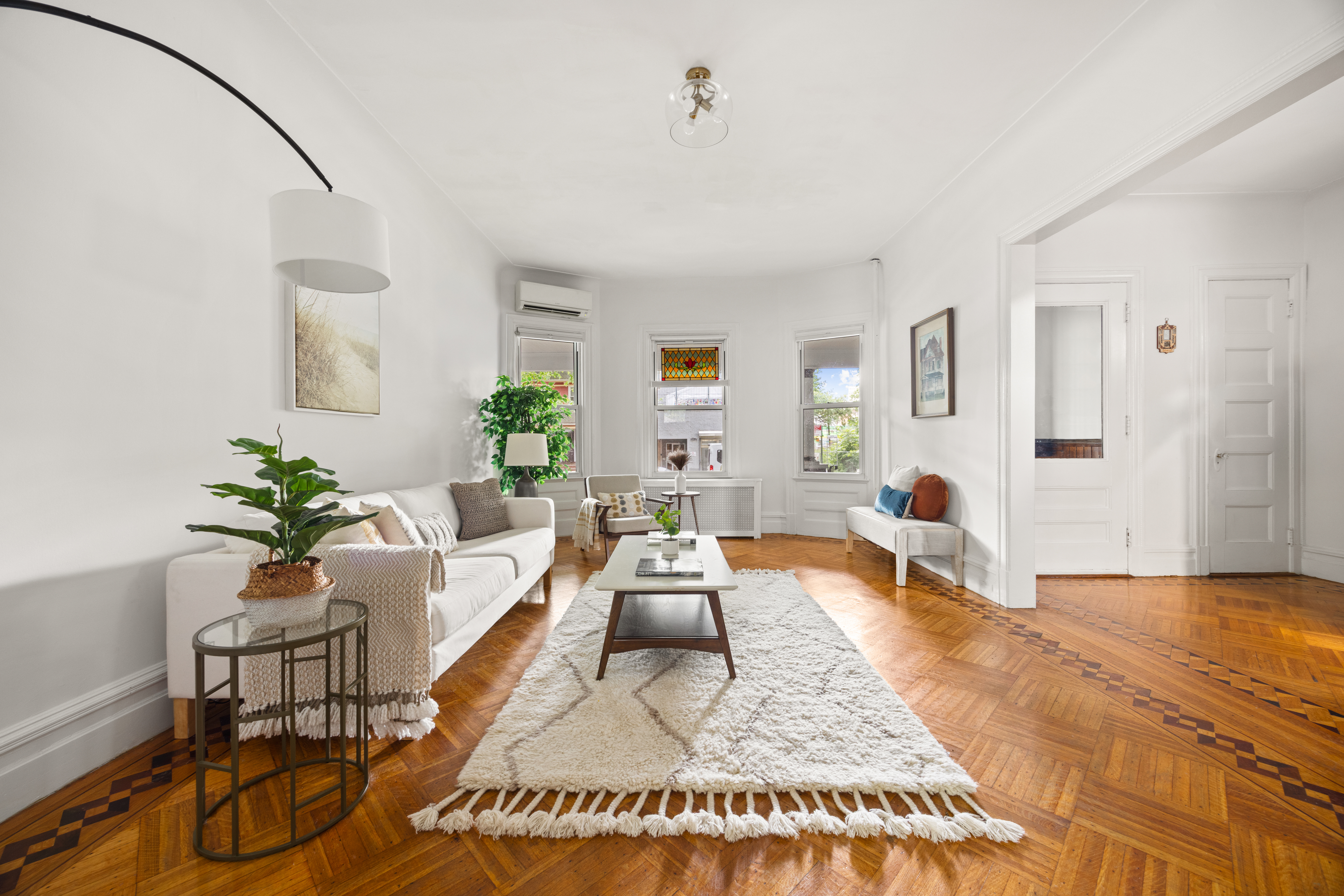 481 Stratford Road Brooklyn, NY 11218 - Photo 4 of 25 a living room with furniture and a wooden floor