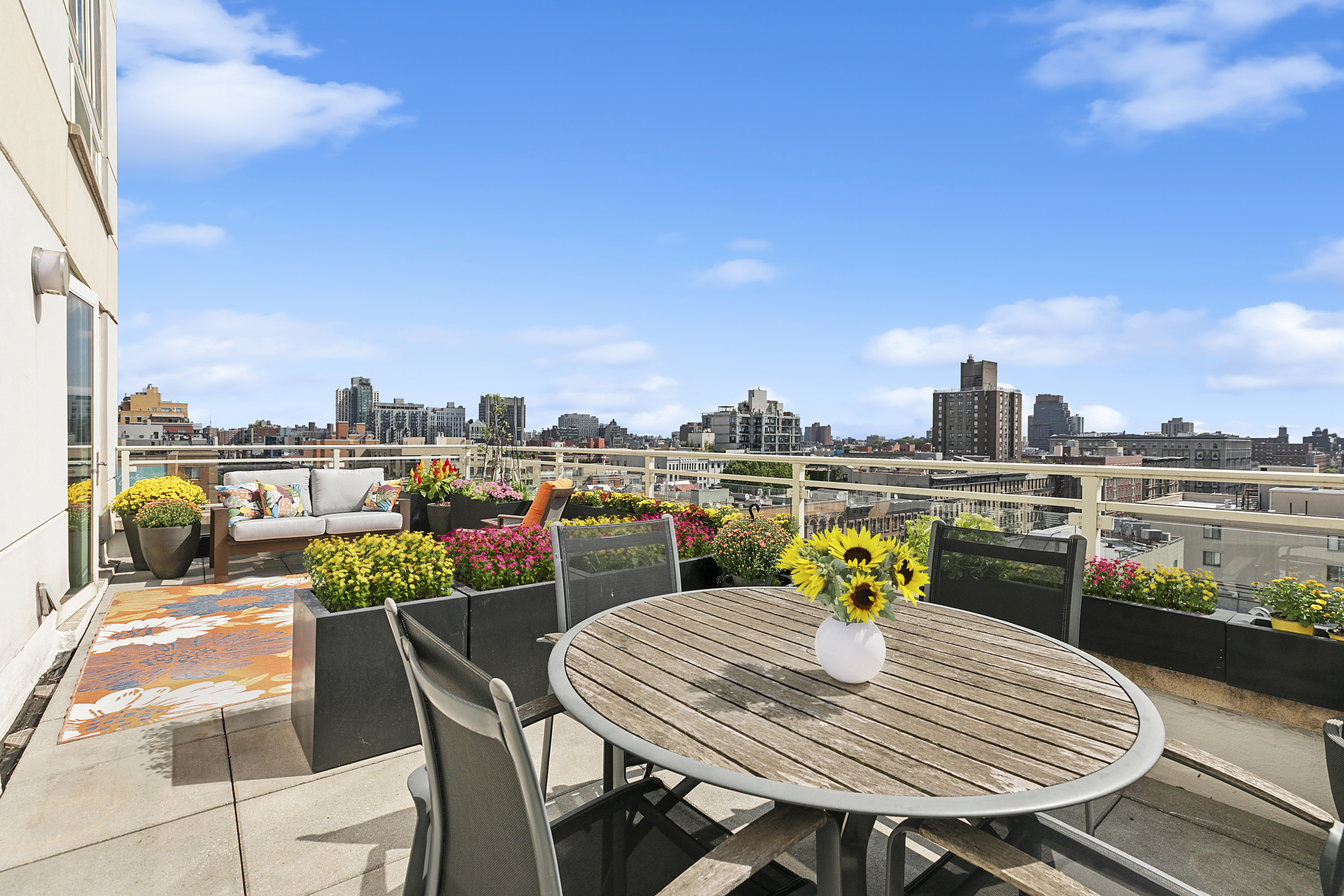 301 West 115th Street, Unit PH1C Manhattan, NY 10026 - Photo 6 of 12 a view of a balcony with a patio