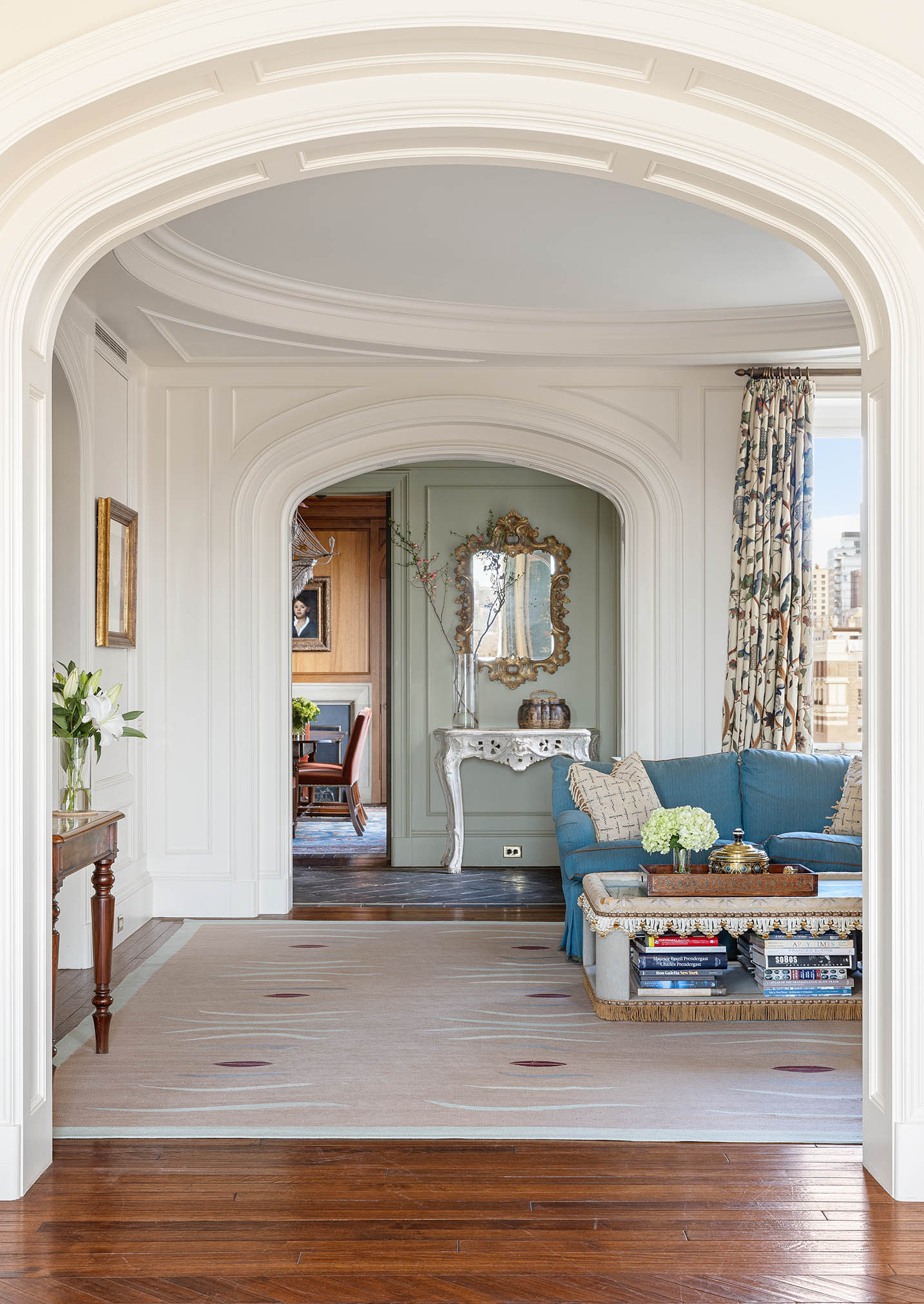 953 5th Avenue, Unit PH Manhattan, NY 10075 - Photo 2 of 27 a living room with furniture and a wooden floor
