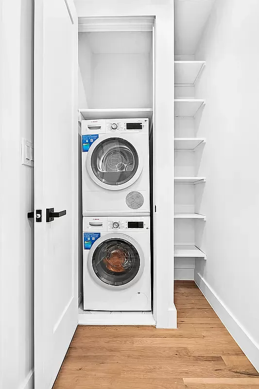 64 Granite Street, Unit 2 Brooklyn, NY 11207 - Photo 5 of 8 a utility room with washing machine