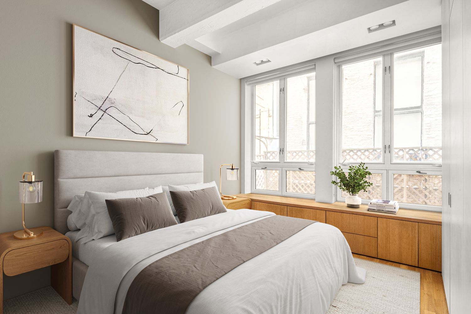 a bedroom with a bed and a large window