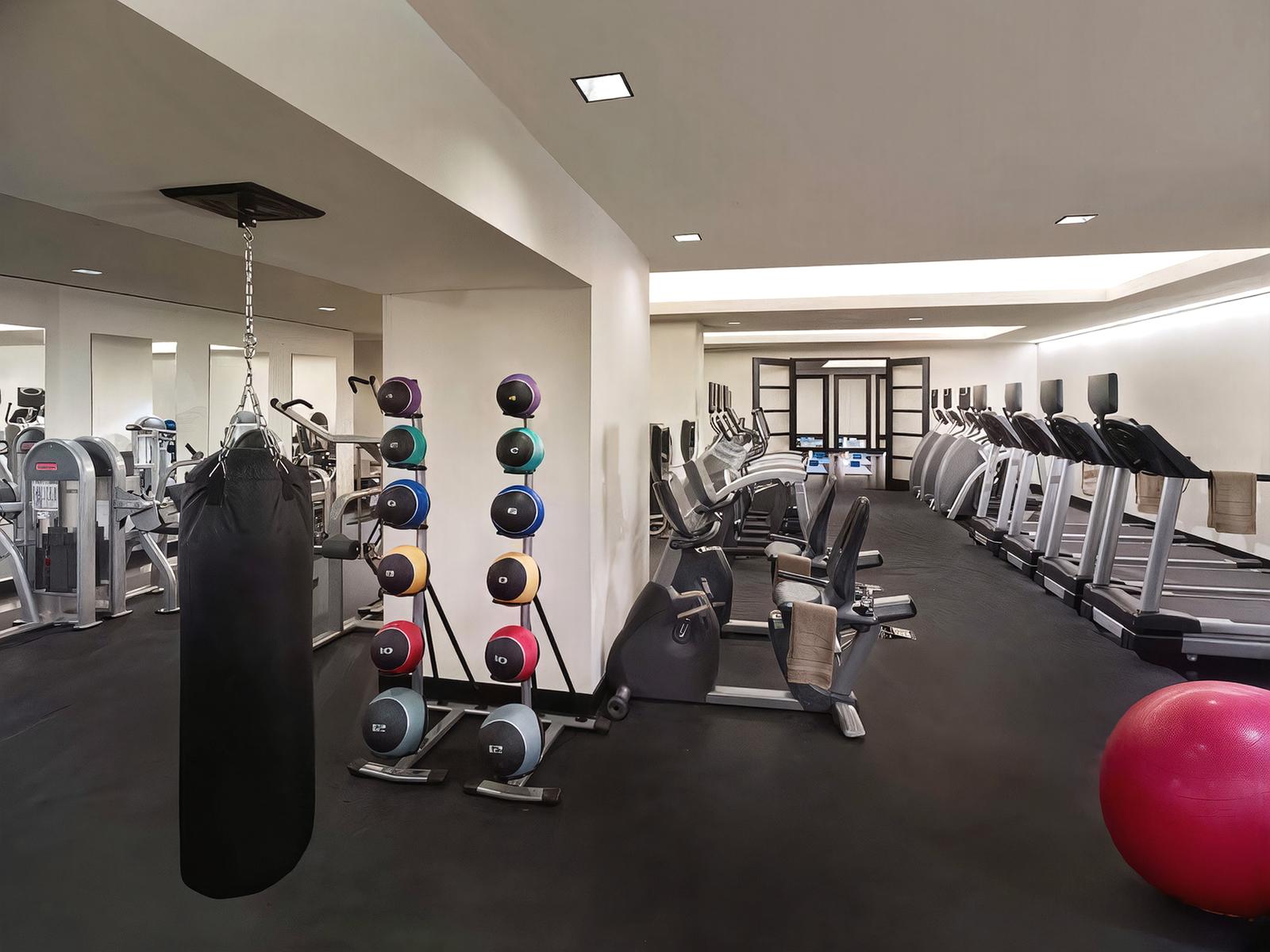 20 Pine Street, Unit 805 Manhattan, NY 10005 - Photo 5 of 8 a view of a room with gym equipment