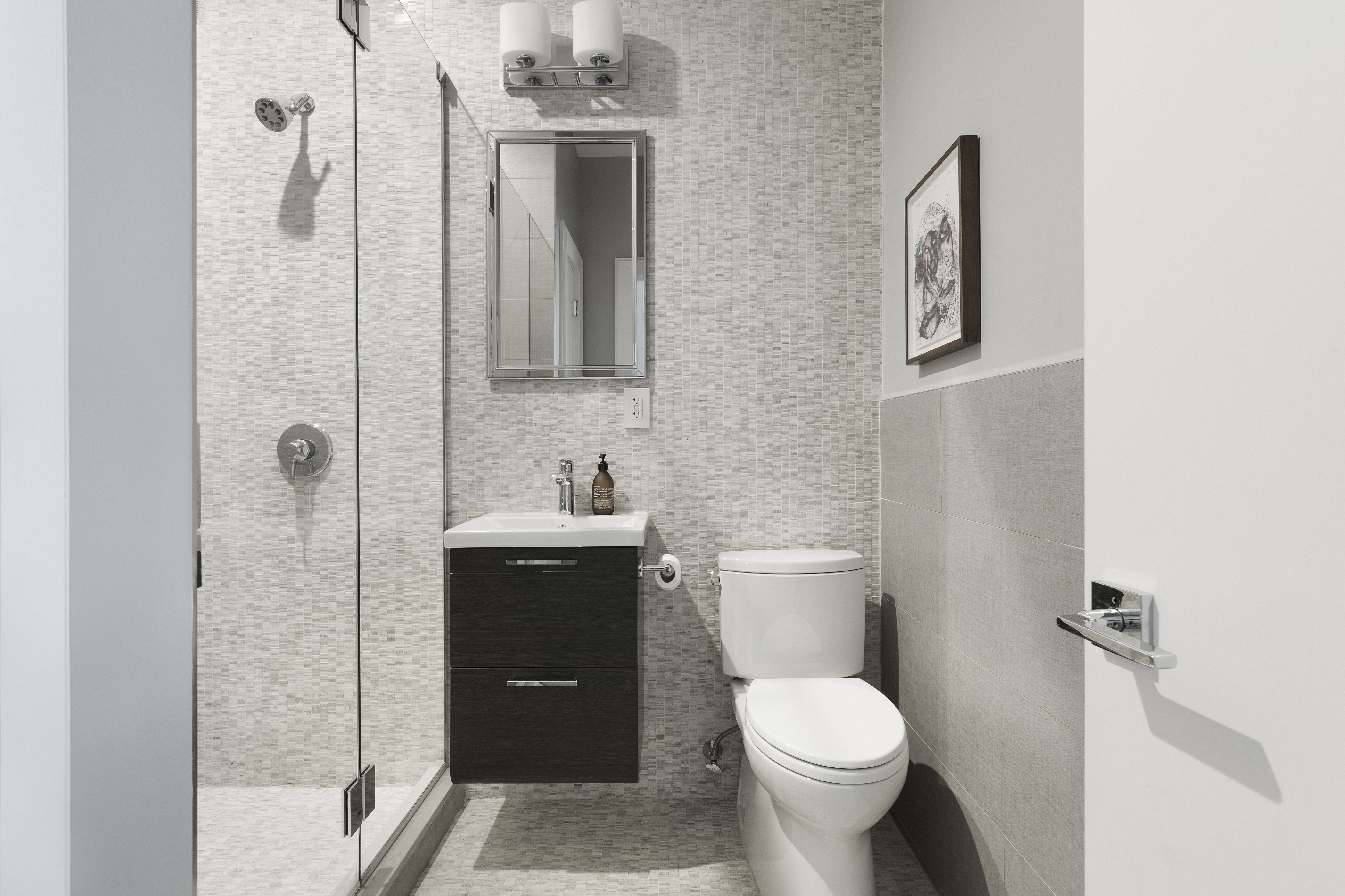 320 West 115th Street Manhattan, NY 10026 - Photo 5 of 11 a bathroom with a toilet sink and shower