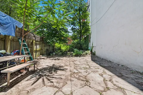 a backyard of a house with lots of green space