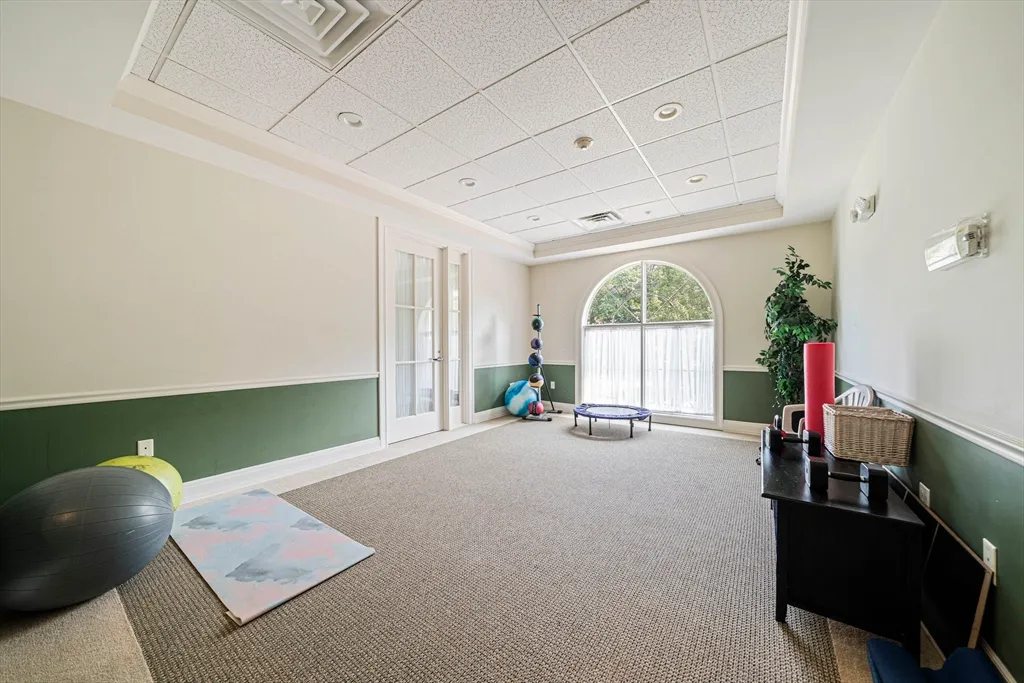 a view of a livingroom with furniture and window