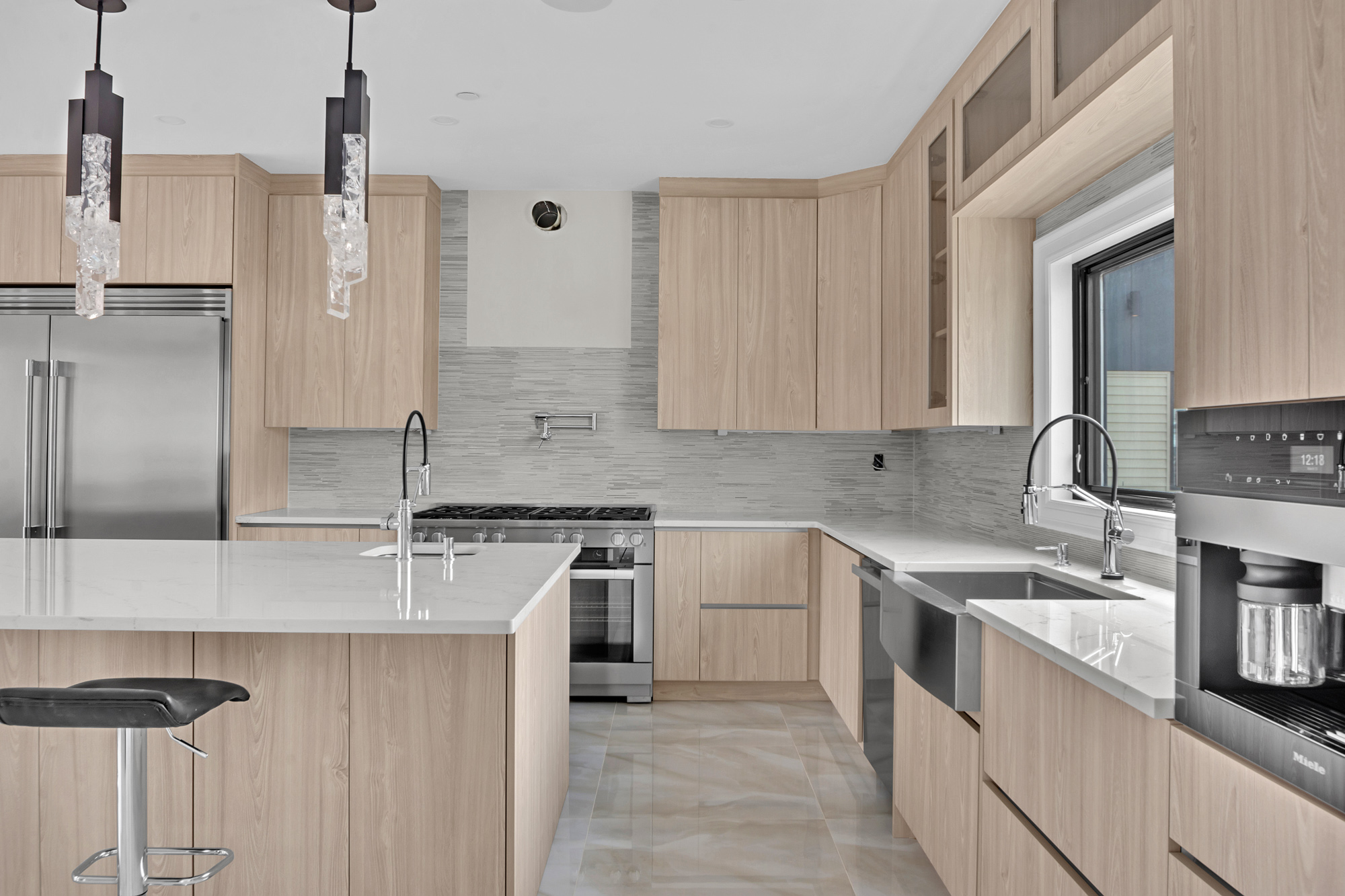 5 Osprey Court Staten Island, NY 10308 - Photo 11 of 50 a kitchen with stainless steel appliances granite countertop a sink stove and refrigerator