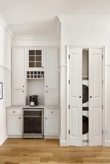a kitchen with stainless steel appliances a stove and a refrigerator
