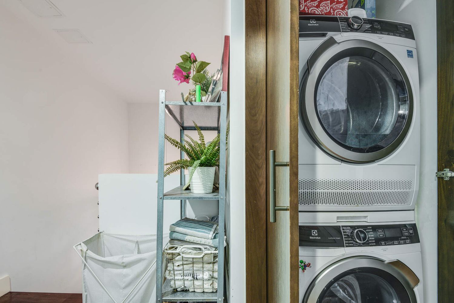 150 Myrtle Avenue, Unit PH3201 Brooklyn, NY 11201 - Photo 25 of 40 a view of a hallway with washer and dryer
