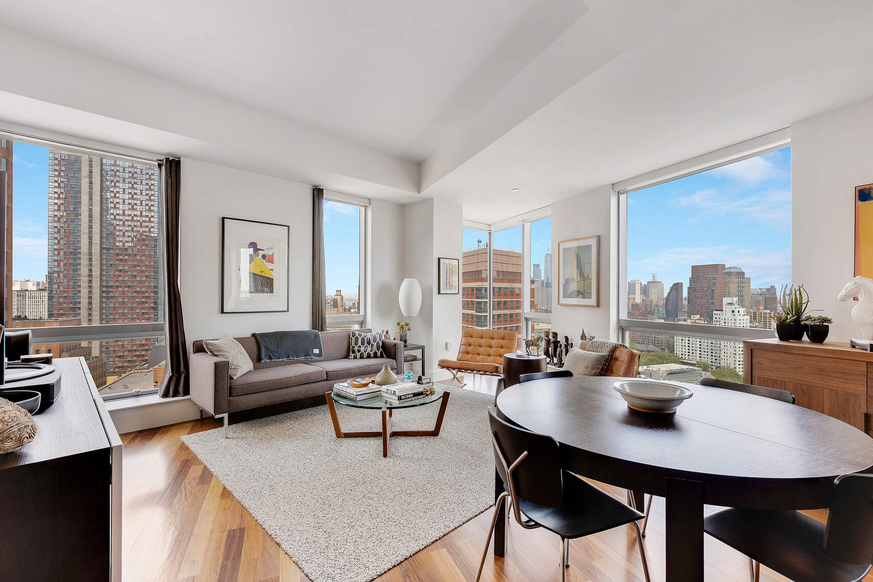 150 Myrtle Avenue, Unit 2503 Brooklyn, NY 11201 - Photo 2 of 28 a living room with furniture and a large window