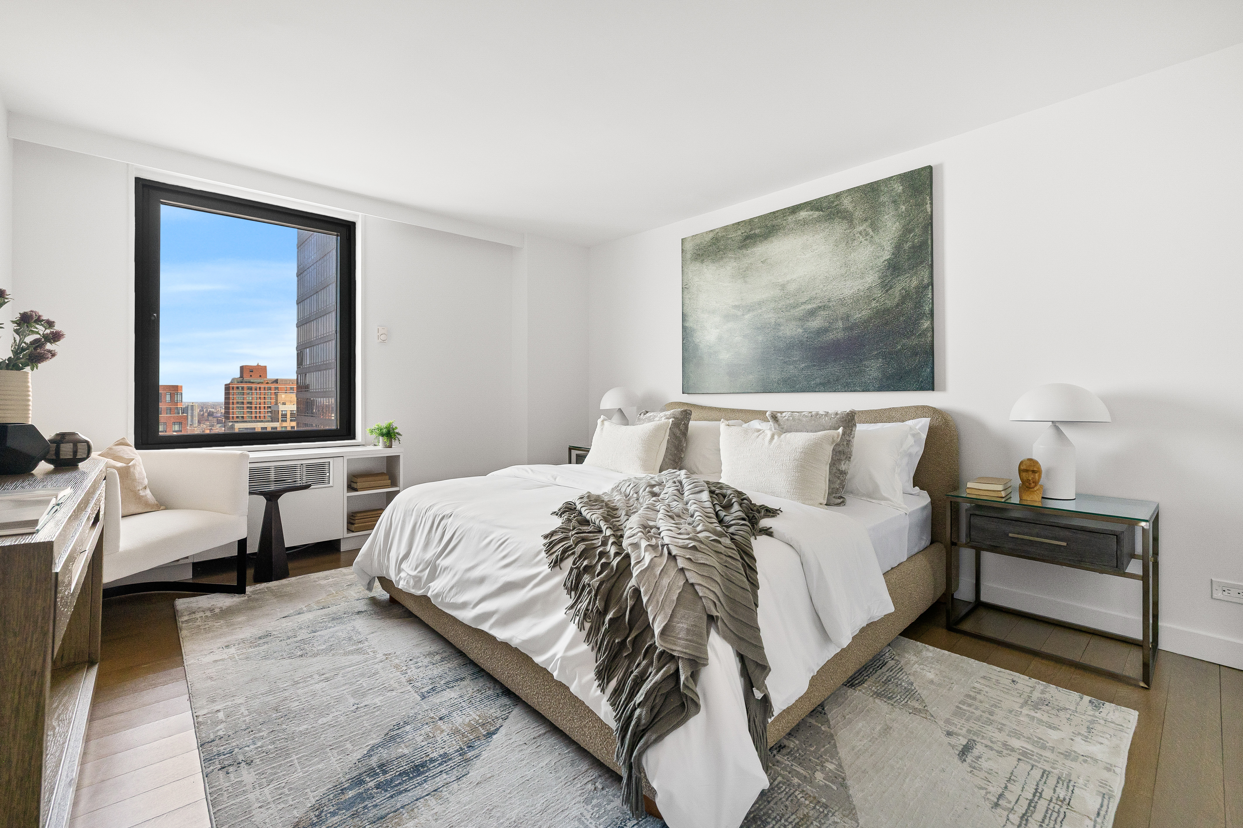 1623 3rd Avenue, Unit 36A Manhattan, NY 10128 - Photo 9 of 17 a bedroom with bed and window