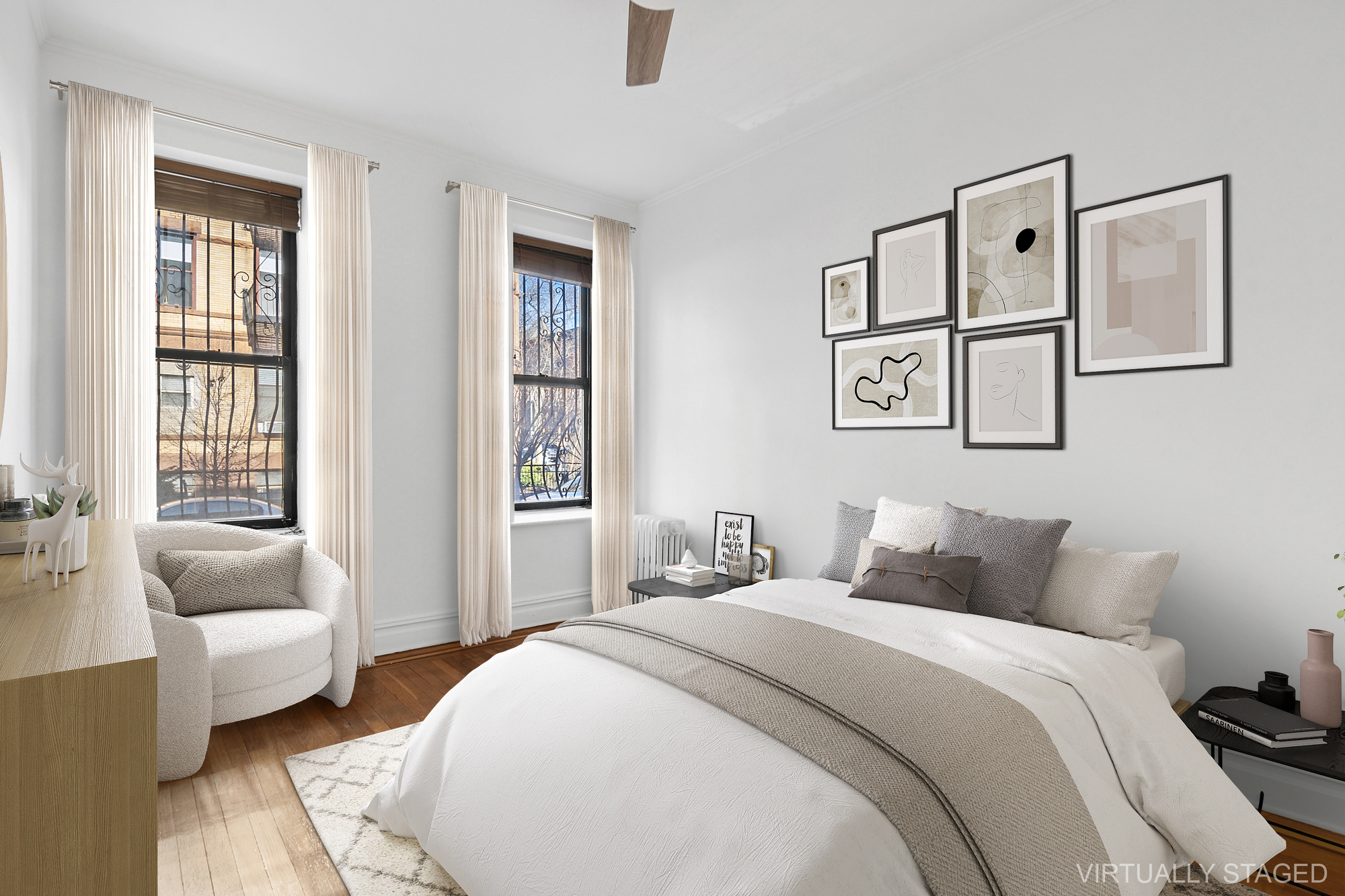 264 6th Avenue, Unit 1C Brooklyn, NY 11215 - Photo 6 of 11 a bedroom with a large bed and a couch