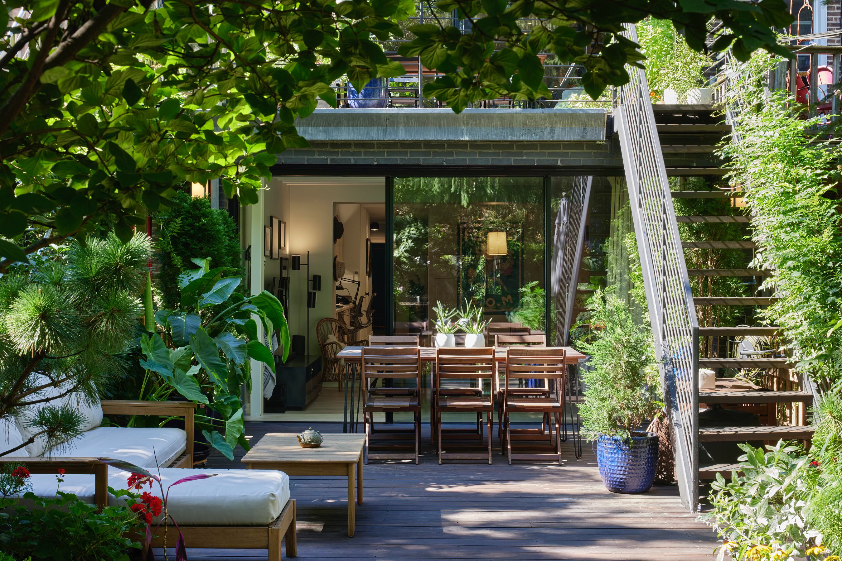 171 Garfield Place Brooklyn, NY 11215 - Photo 14 of 19 a view of house with outdoor seating and trees