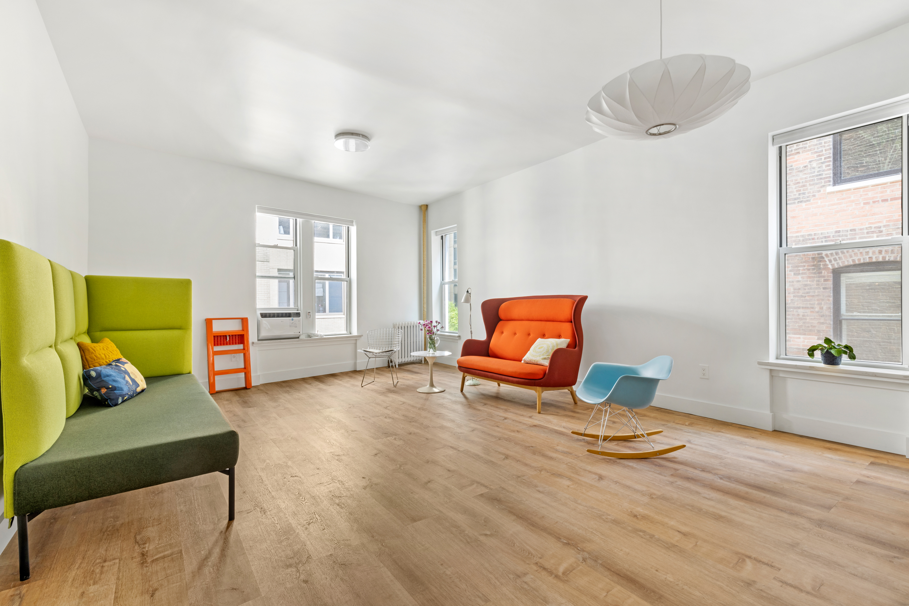 345 West 70th Street, Unit 5F Manhattan, NY 10023 - Photo 1 of 13 a living room with furniture and a window