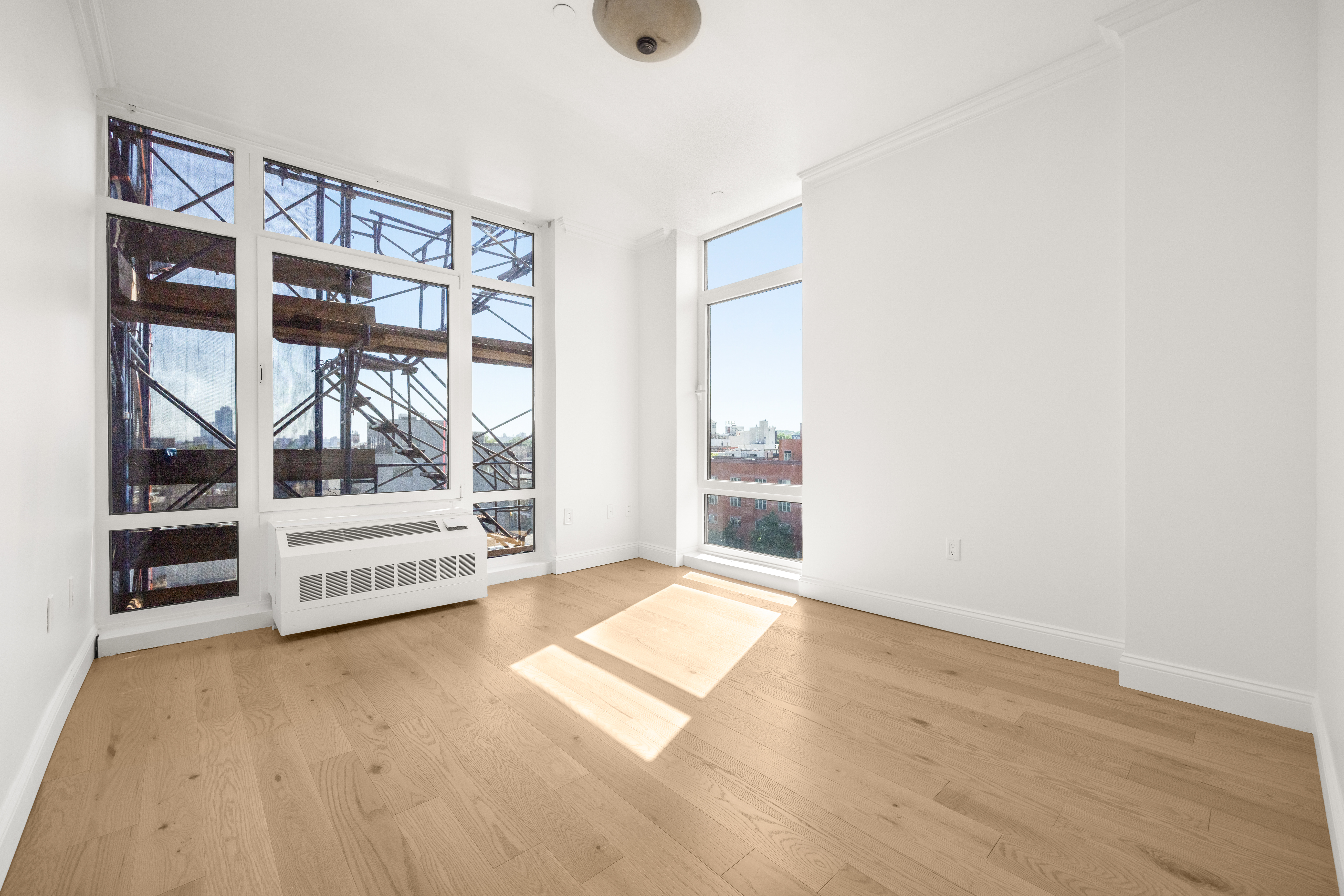 162 16th Street, Unit 7E Brooklyn, NY 11215 - Photo 20 of 23 a view of an empty room with glass door
